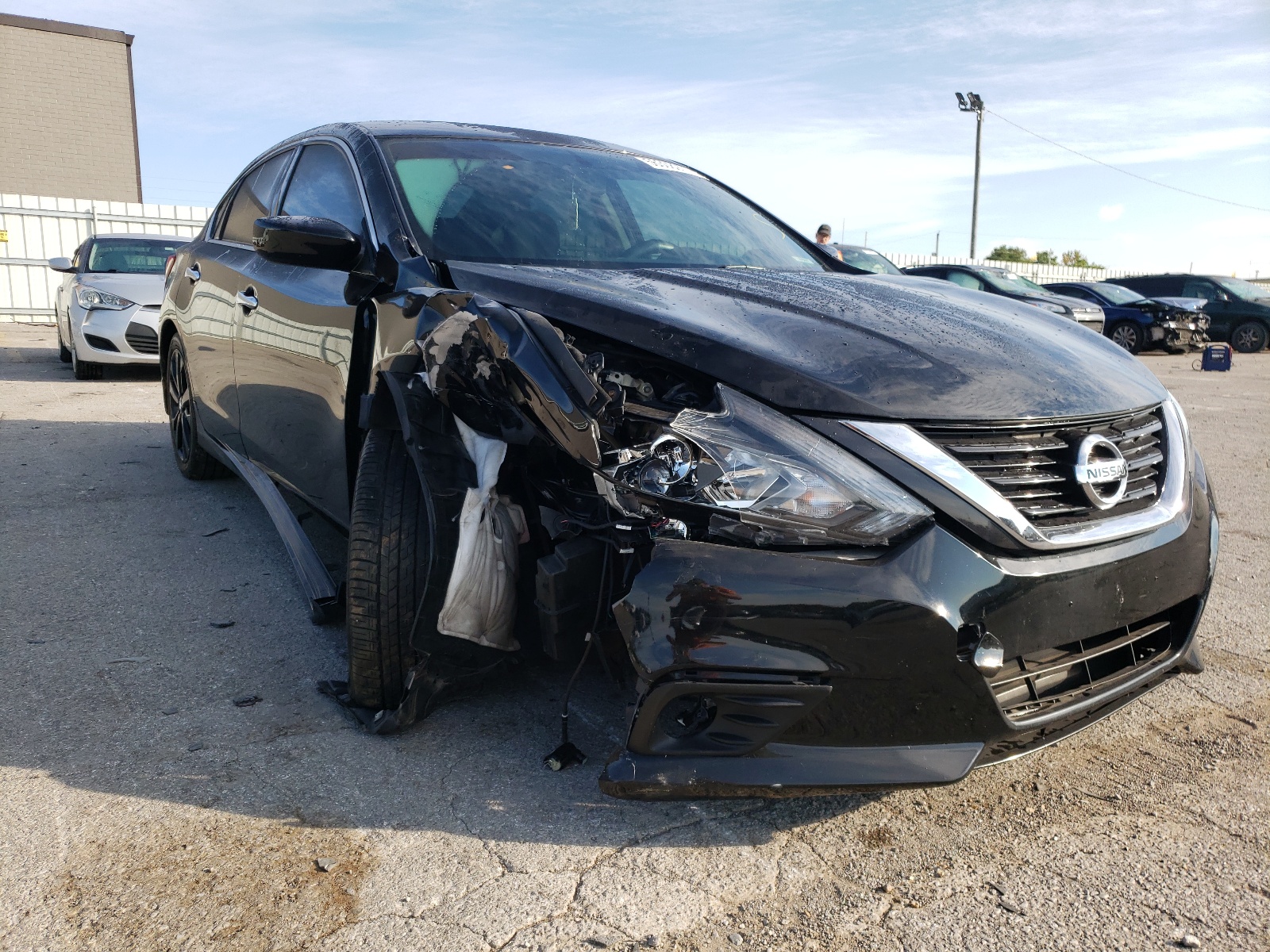 Photo 9 from auction – 2017 NISSAN ALTIMA 2.5 with VIN 1N4AL3AP2HC266628