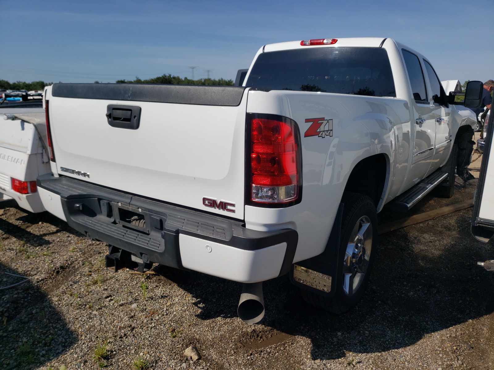 Photo 4 from auction – 2011 GMC SIERRA K25 with VIN 1GT125C81BF257424