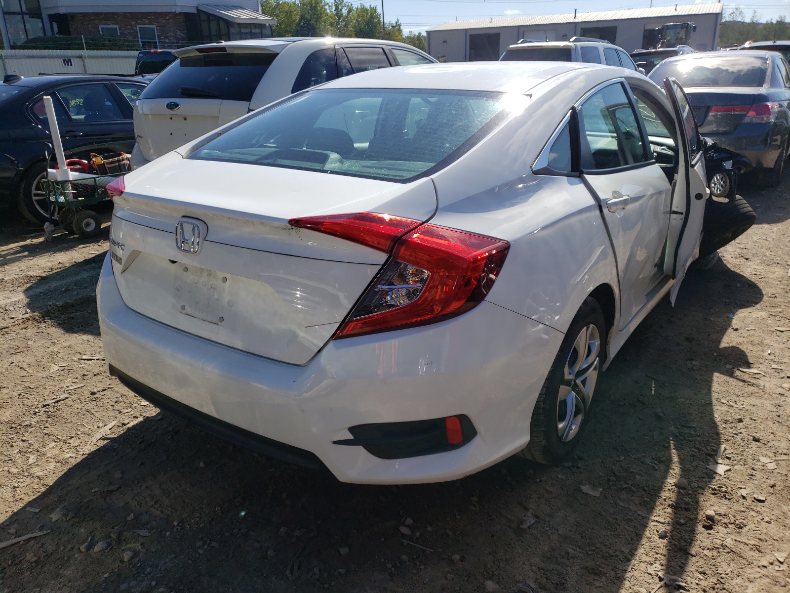 Photo 4 from auction – 2016 HONDA CIVIC LX with VIN 19XFC2E59GE051029