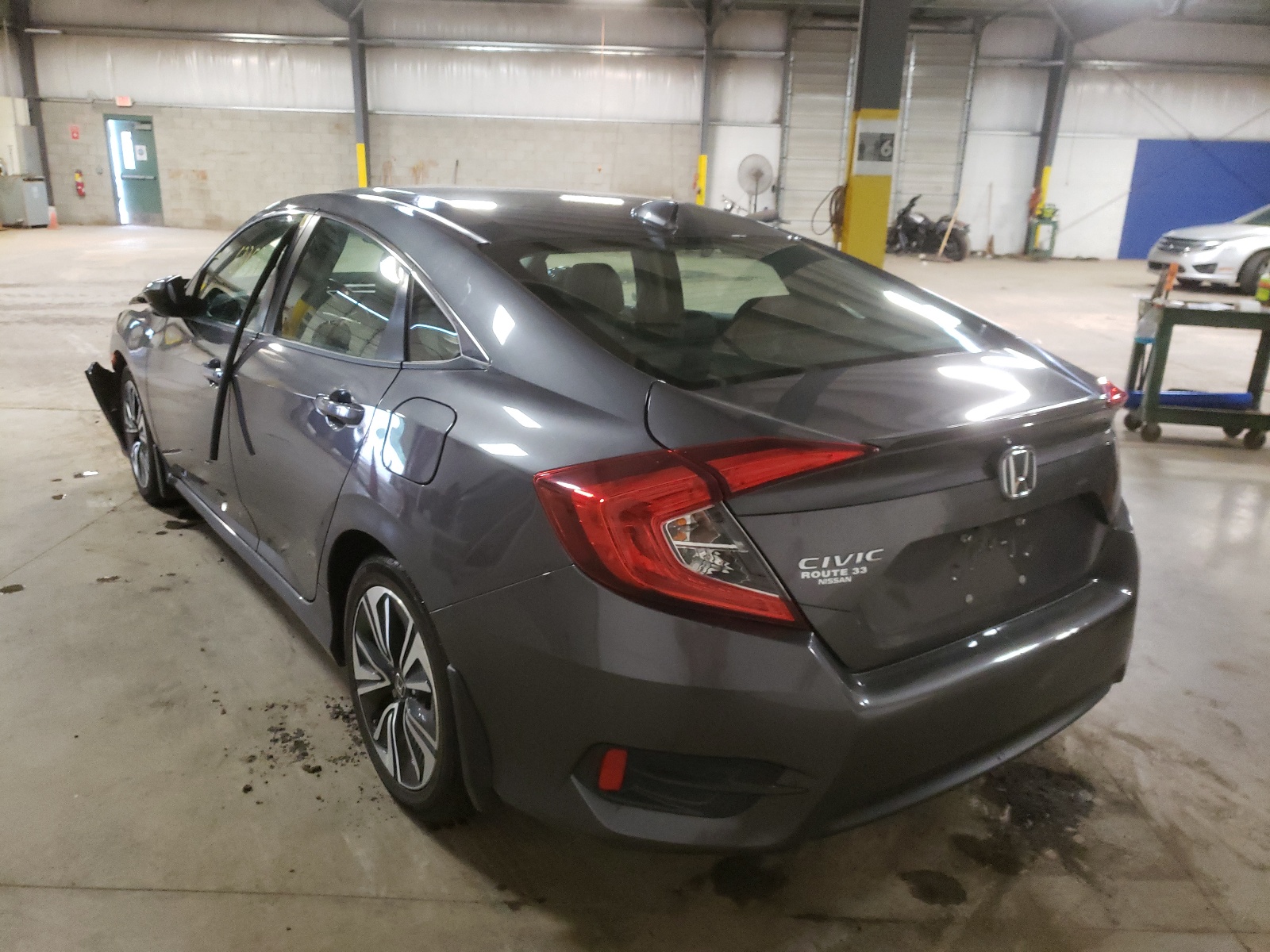 Photo 3 from auction – 2016 HONDA CIVIC EXL with VIN 2HGFC1F71GH656551