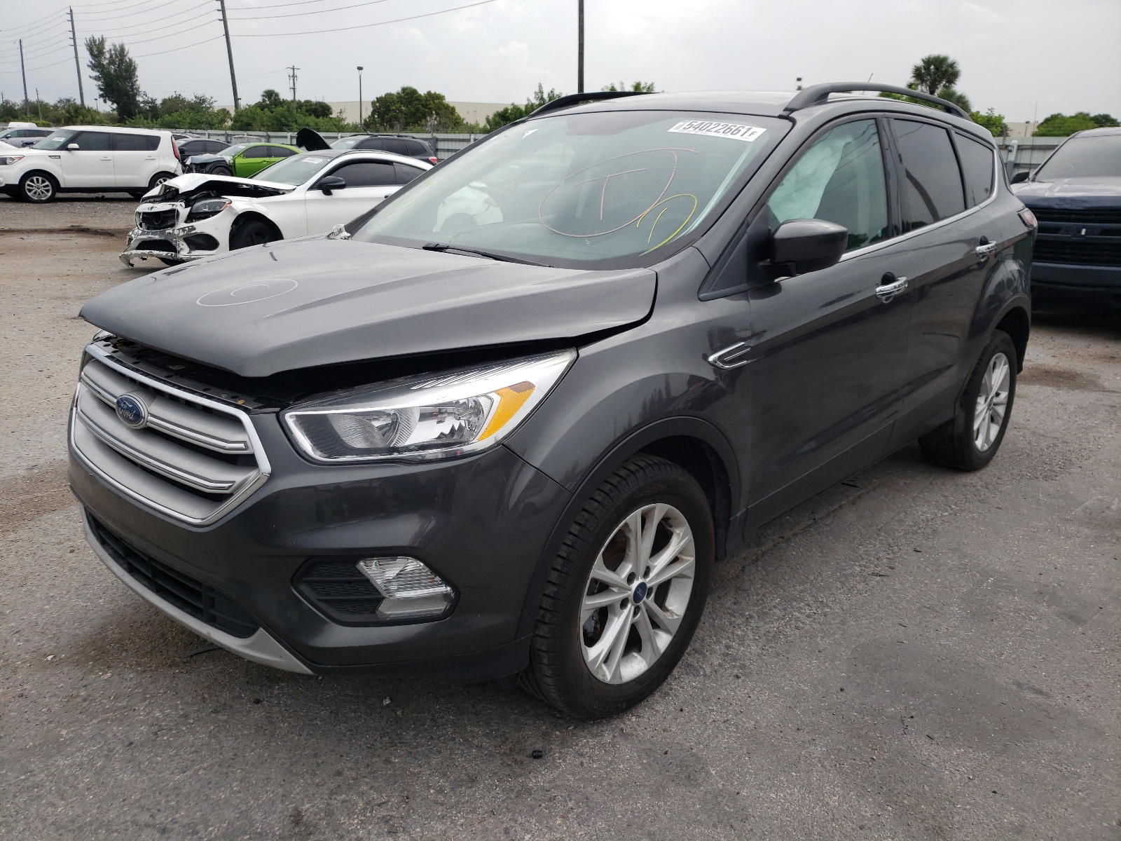 Photo 2 from auction – 2018 FORD ESCAPE SE with VIN 1FMCU0GD5JUB61797