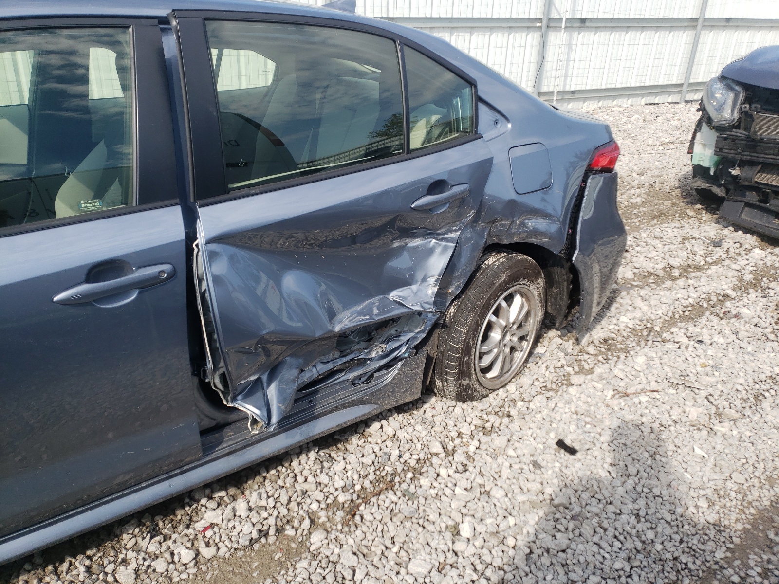 Photo 9 from auction – 2021 TOYOTA COROLLA LE with VIN JTDEAMDE1MJ021519