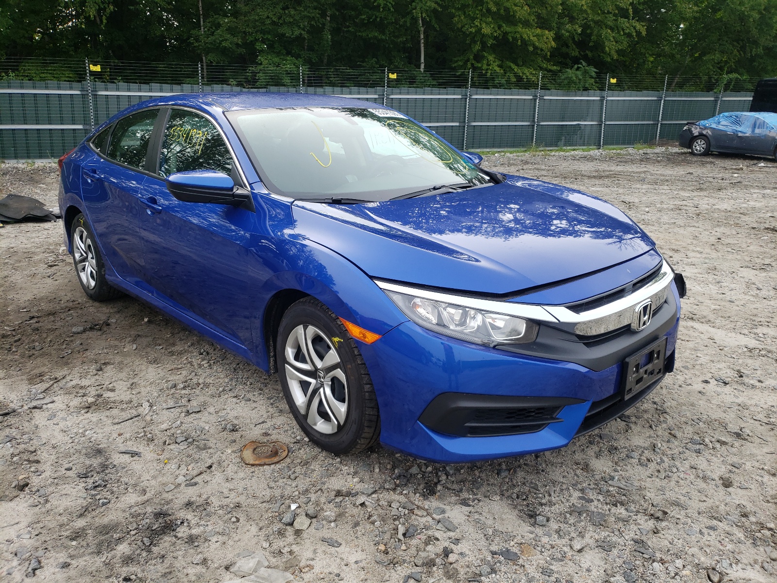 HONDA CIVIC LX 2018 with VIN 19XFC2F57JE029620 - Photo from auction