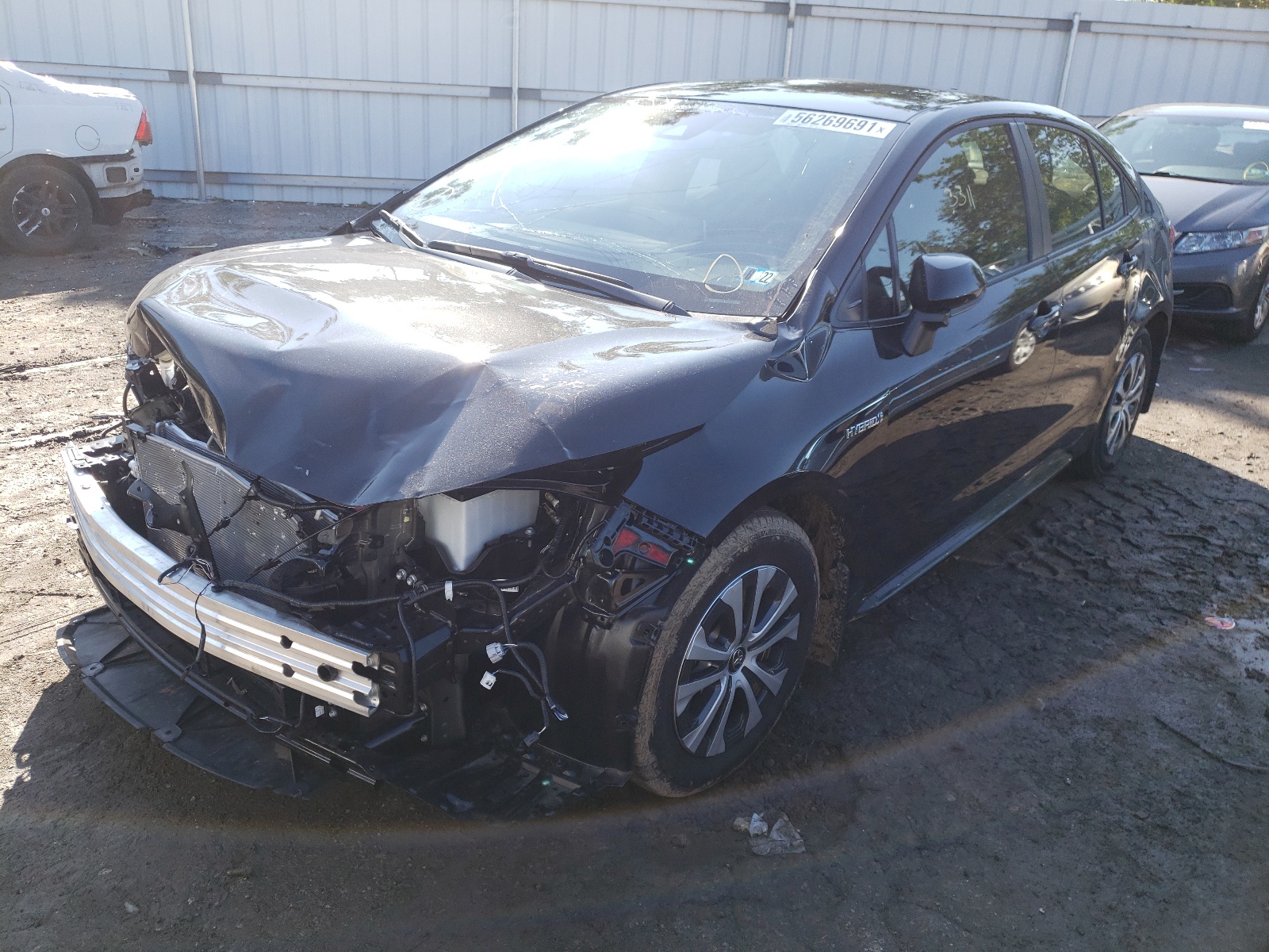 Photo 2 from auction – 2021 TOYOTA COROLLA LE with VIN JTDEAMDE4MJ029338