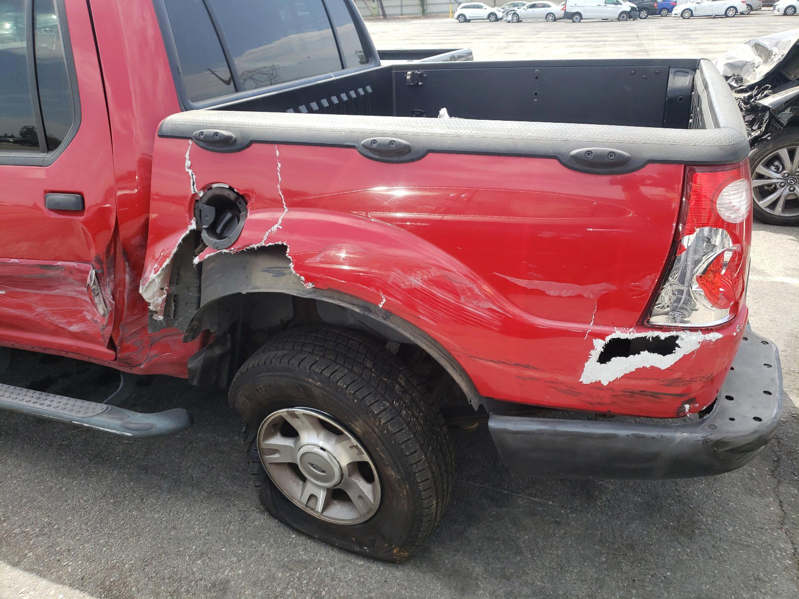Photo 9 from auction – 2005 FORD EXPLORER S with VIN 1FMZU67KX5UA63835