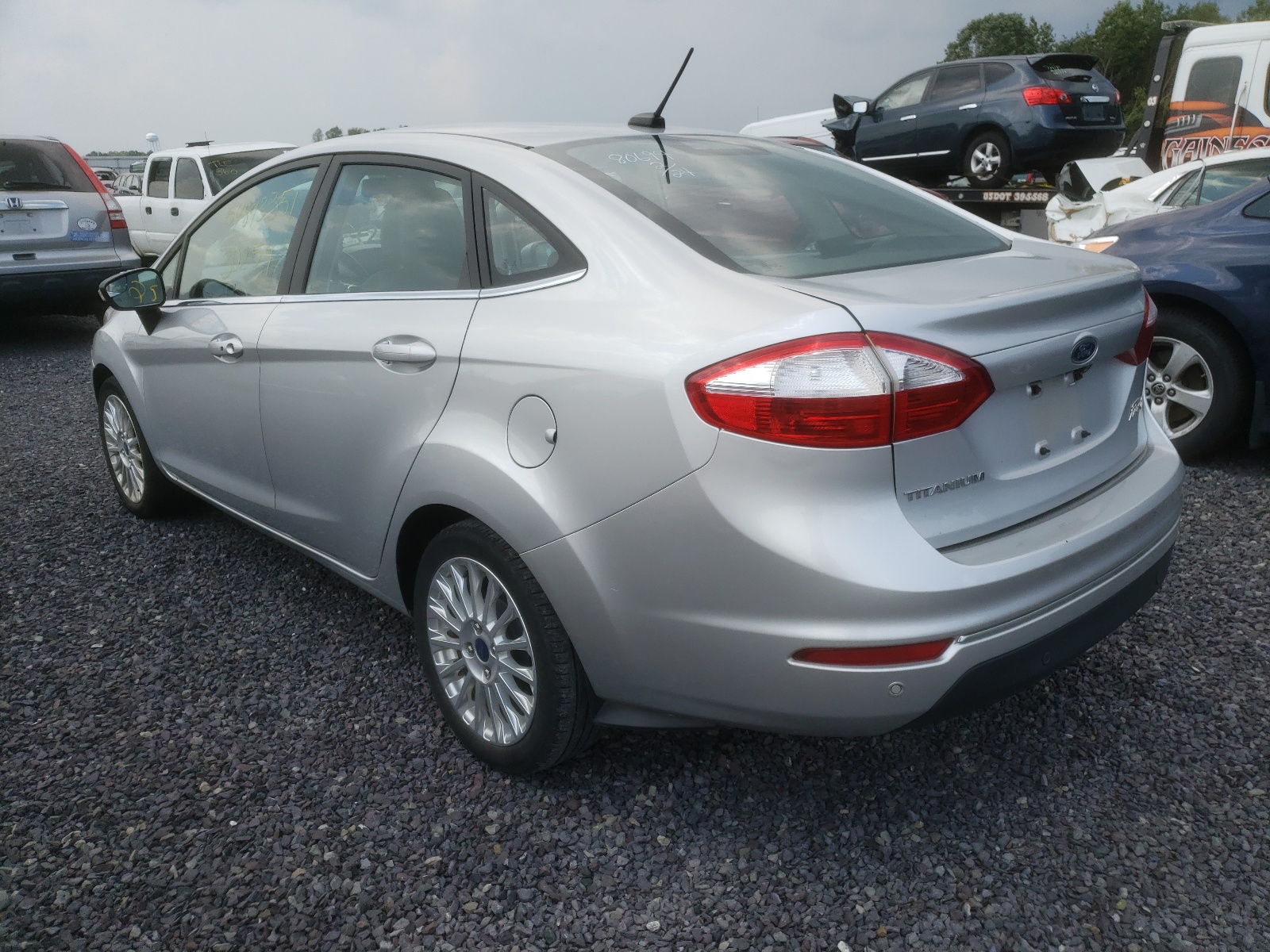 Photo 3 from auction – 2014 FORD FIESTA TIT with VIN 3FADP4CJ2EM204088