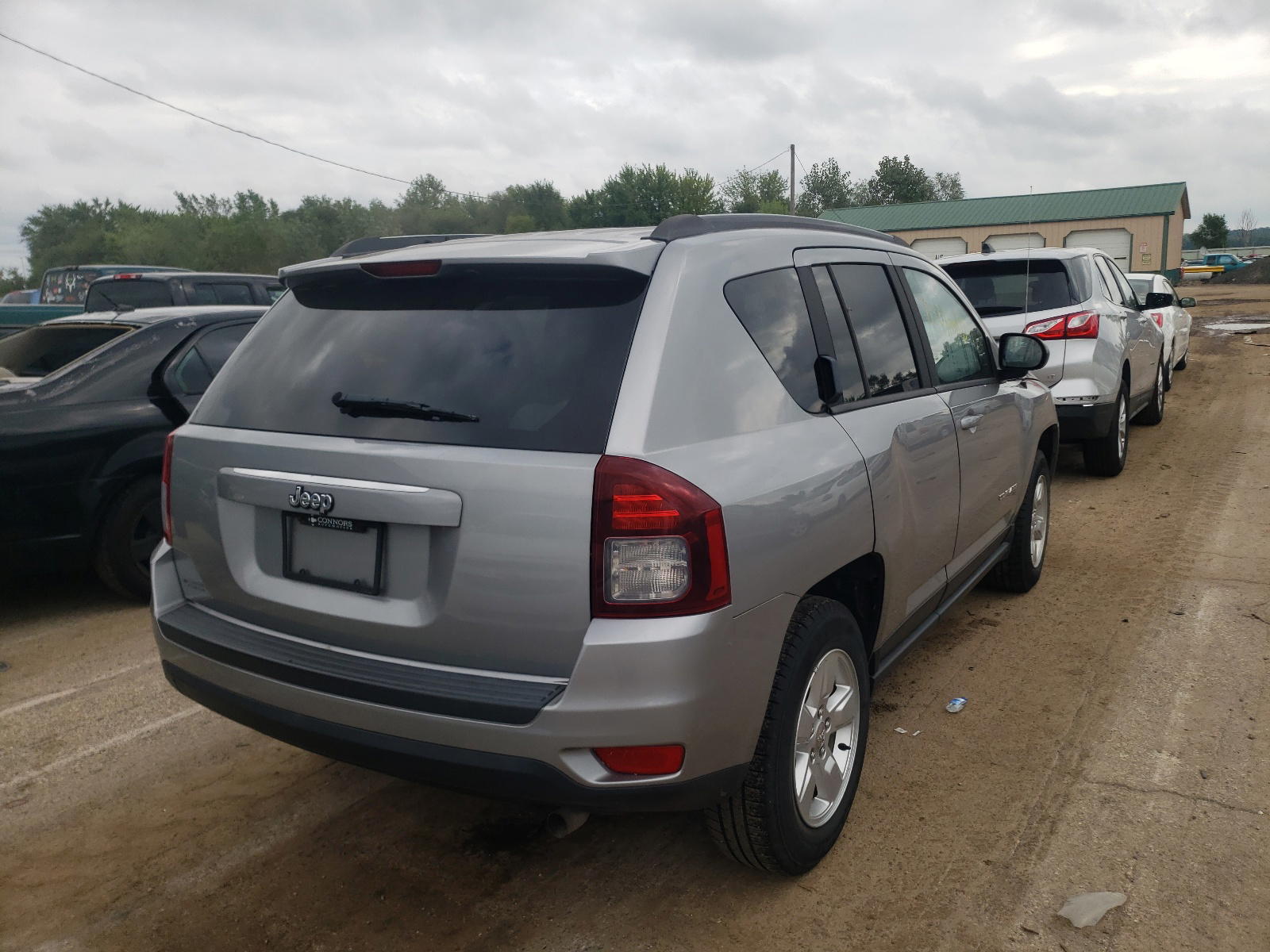 Photo 4 from auction – 2015 JEEP COMPASS SP with VIN 1C4NJCBA4FD401403