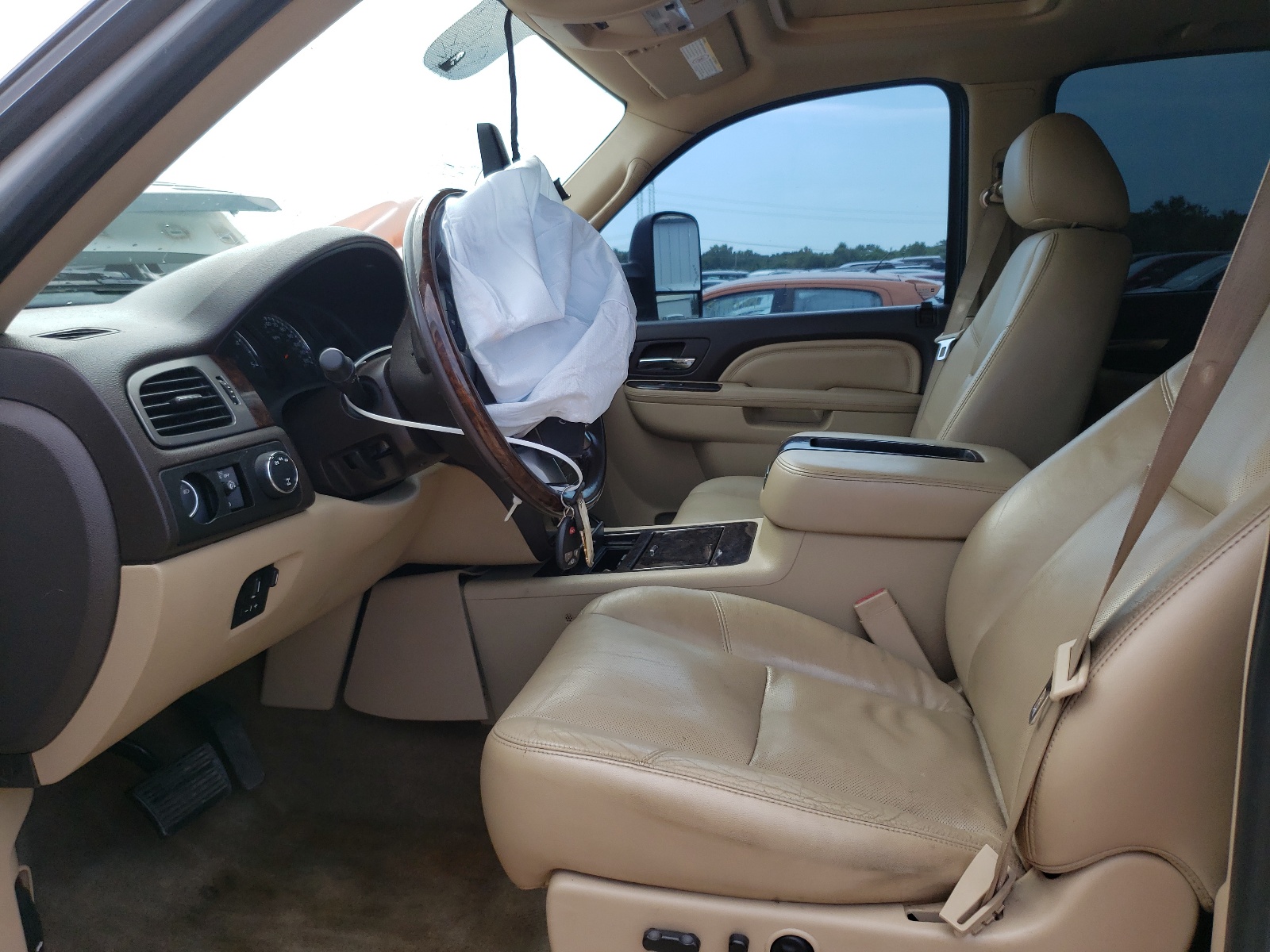 Photo 5 from auction – 2011 GMC SIERRA K25 with VIN 1GT125C81BF257424