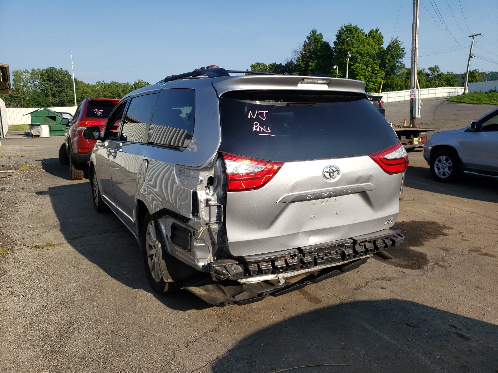 Photo 3 from auction – 2015 TOYOTA SIENNA LE with VIN 5TDJK3DC8FS094932