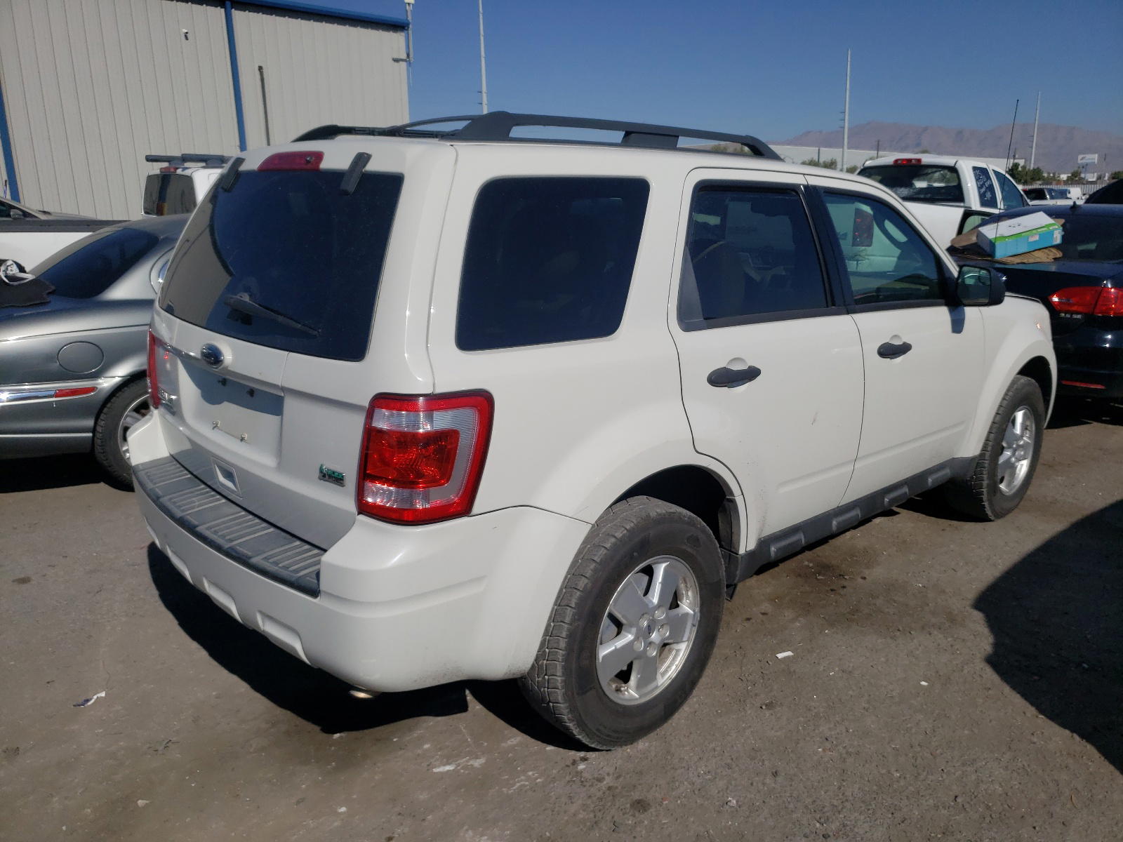 Photo 4 from auction – 2011 FORD ESCAPE XLT with VIN 1FMCU9DG1BKA51099