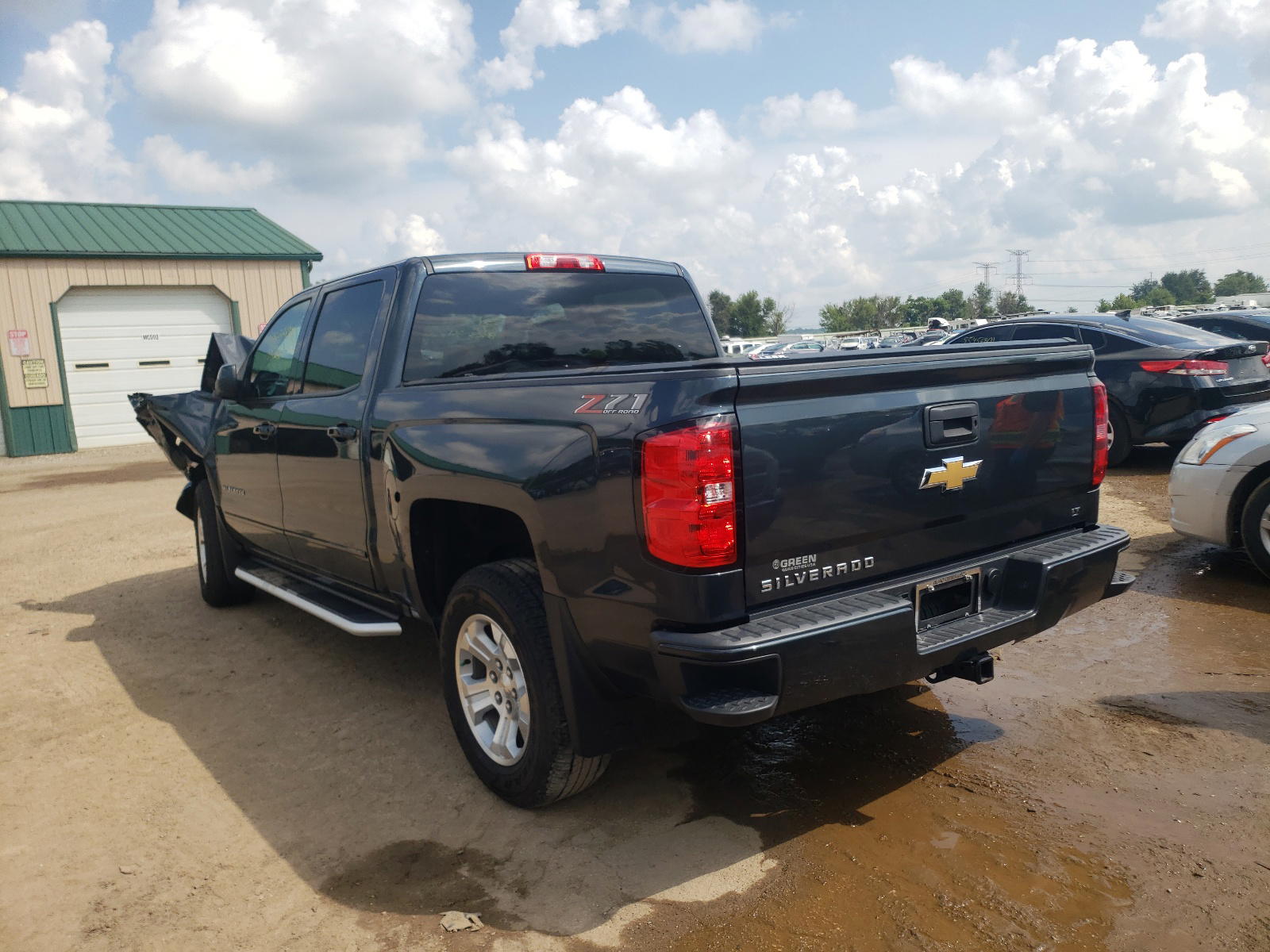 Photo 3 from auction – 2018 CHEVROLET SILVERADO with VIN 3GCUKREC8JG474097