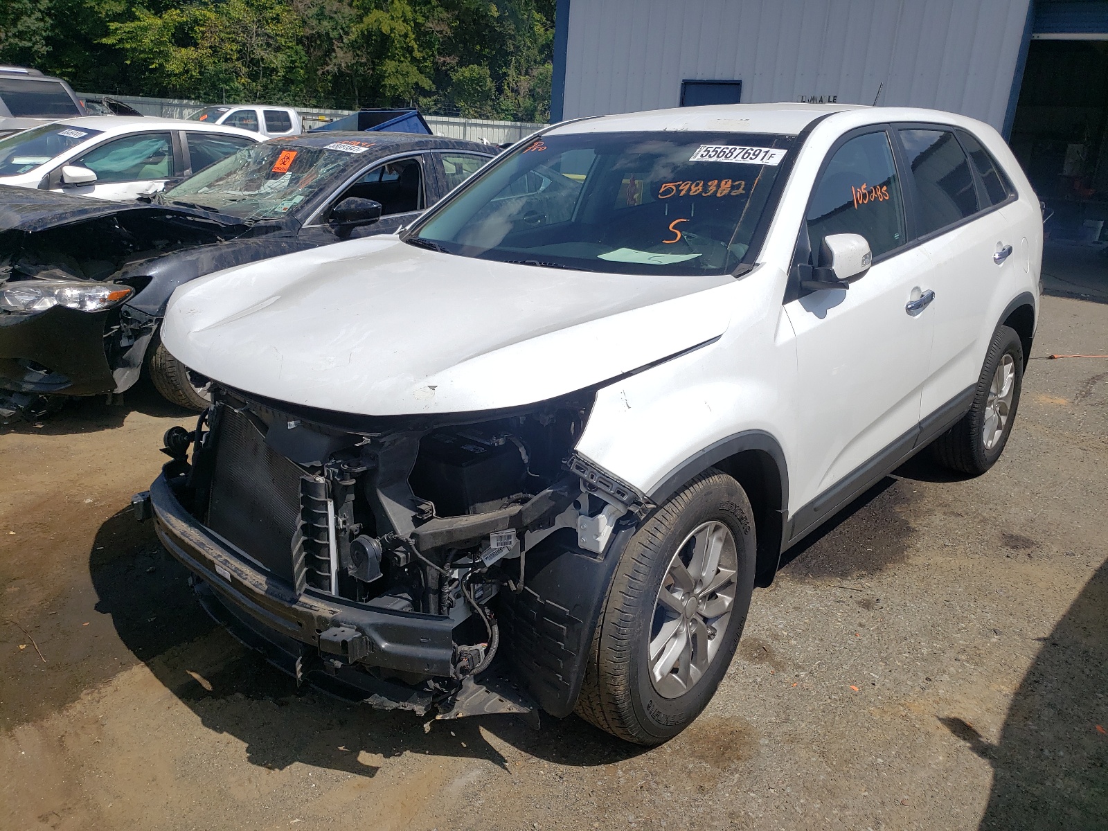 Photo 2 from auction – 2015 KIA SORENTO LX with VIN 5XYKT3A63FG598382
