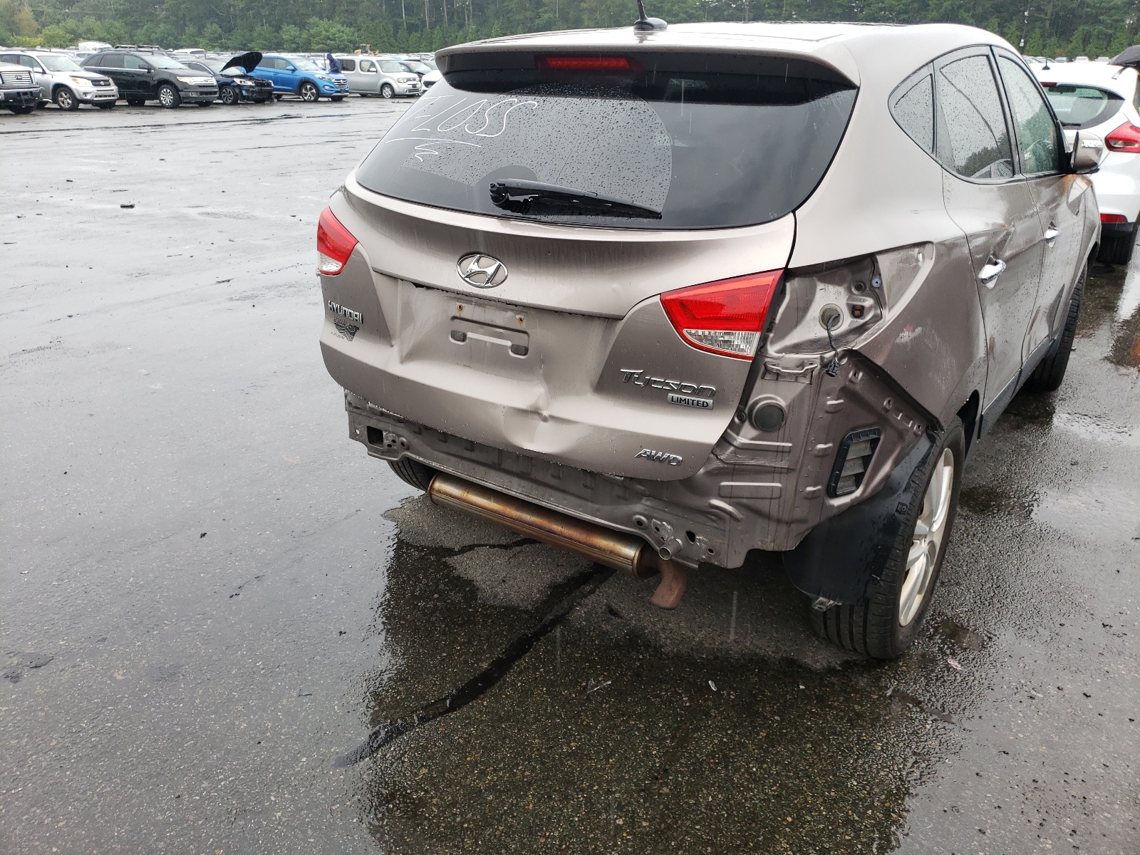 Photo 9 from auction – 2012 HYUNDAI TUCSON GLS with VIN KM8JUCAC0CU543179