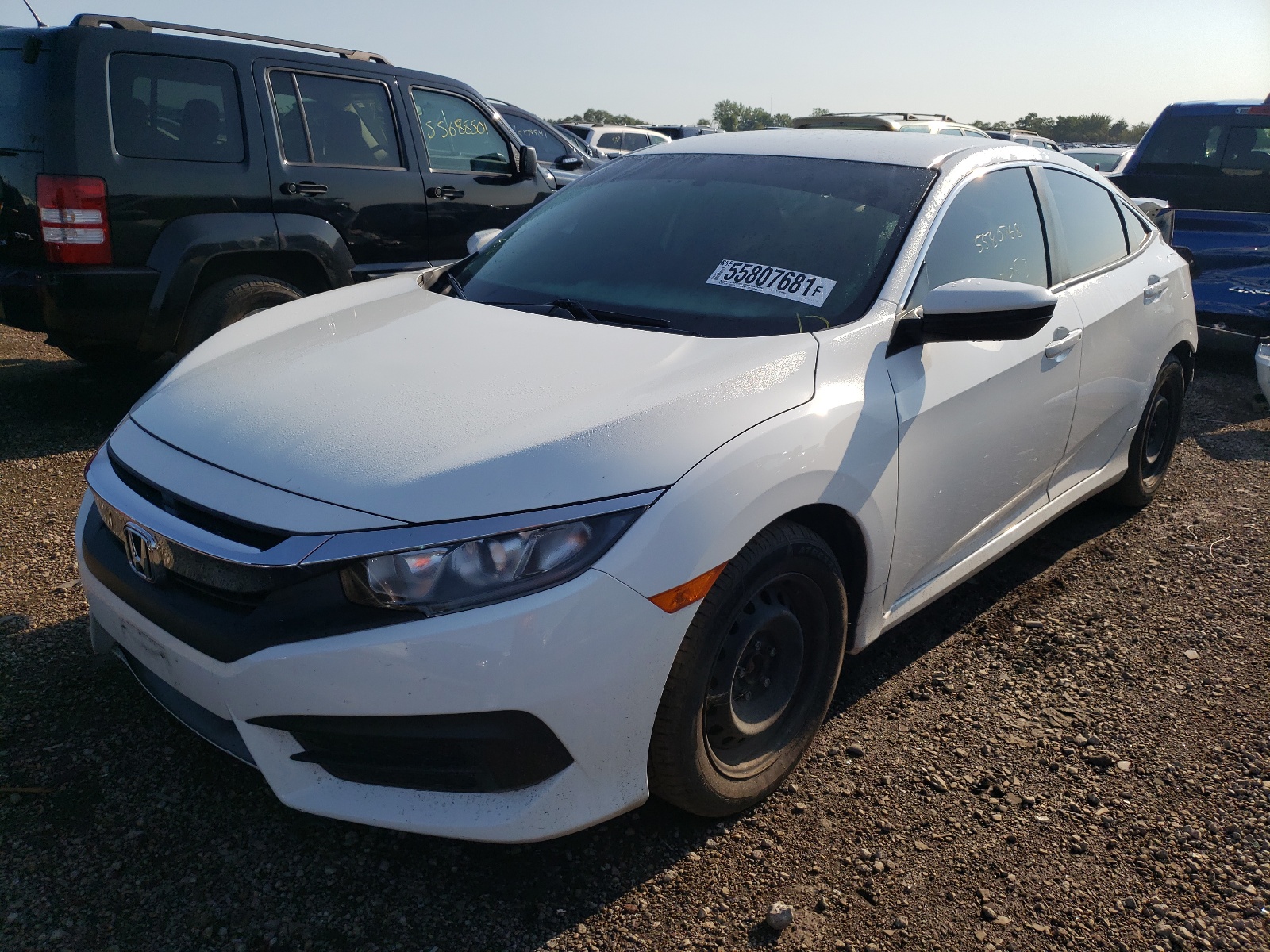 Photo 2 from auction – 2016 HONDA CIVIC LX with VIN 2HGFC2F51GH519081