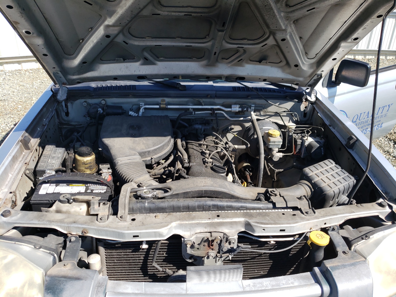 Photo 7 from auction – 2003 NISSAN FRONTIER K with VIN 1N6DD26T13C403892