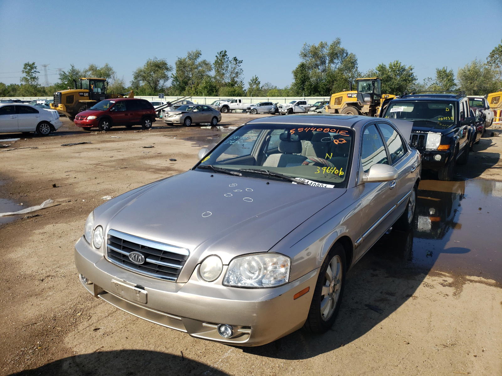 Photo 2 from auction – 2005 KIA OPTIMA LX with VIN KNAGD128655396406