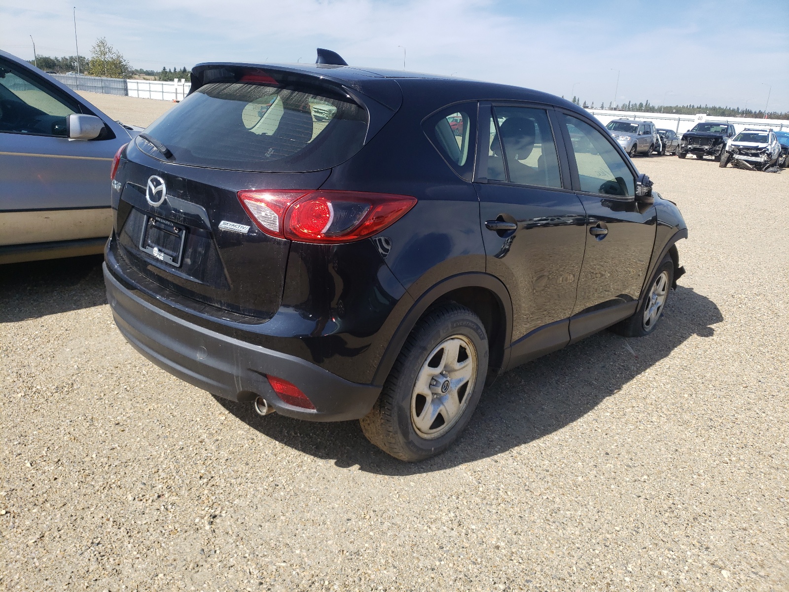 Photo 4 from auction – 2014 MAZDA CX-5 SPORT with VIN JM3KE2BE2E0390273