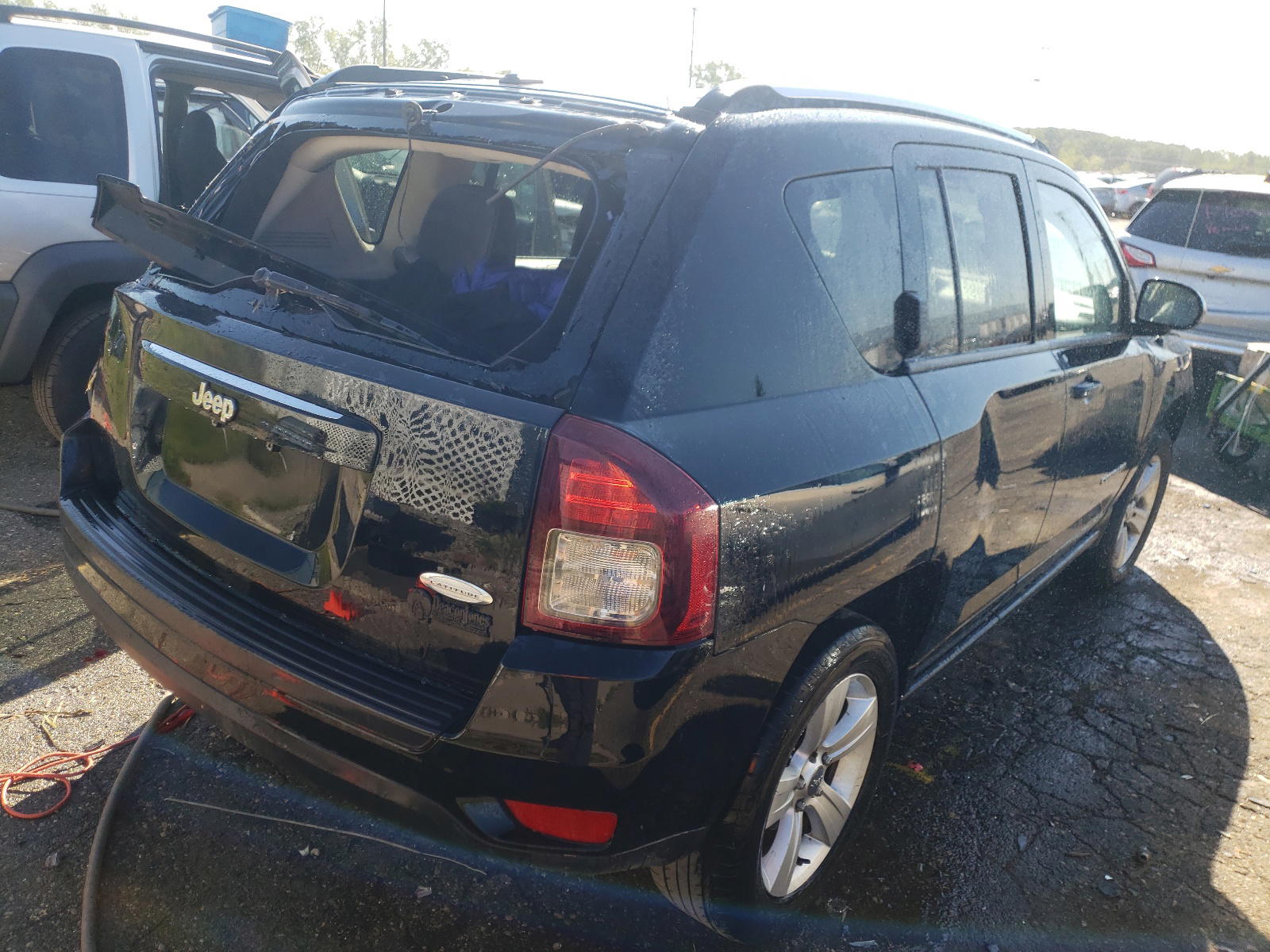 Photo 4 from auction – 2014 JEEP COMPASS LA with VIN 1C4NJCEB7ED547300