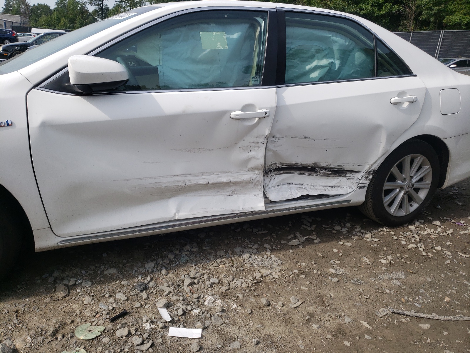 Photo 9 from auction – 2012 TOYOTA CAMRY HYBR with VIN 4T1BD1FK9CU038864
