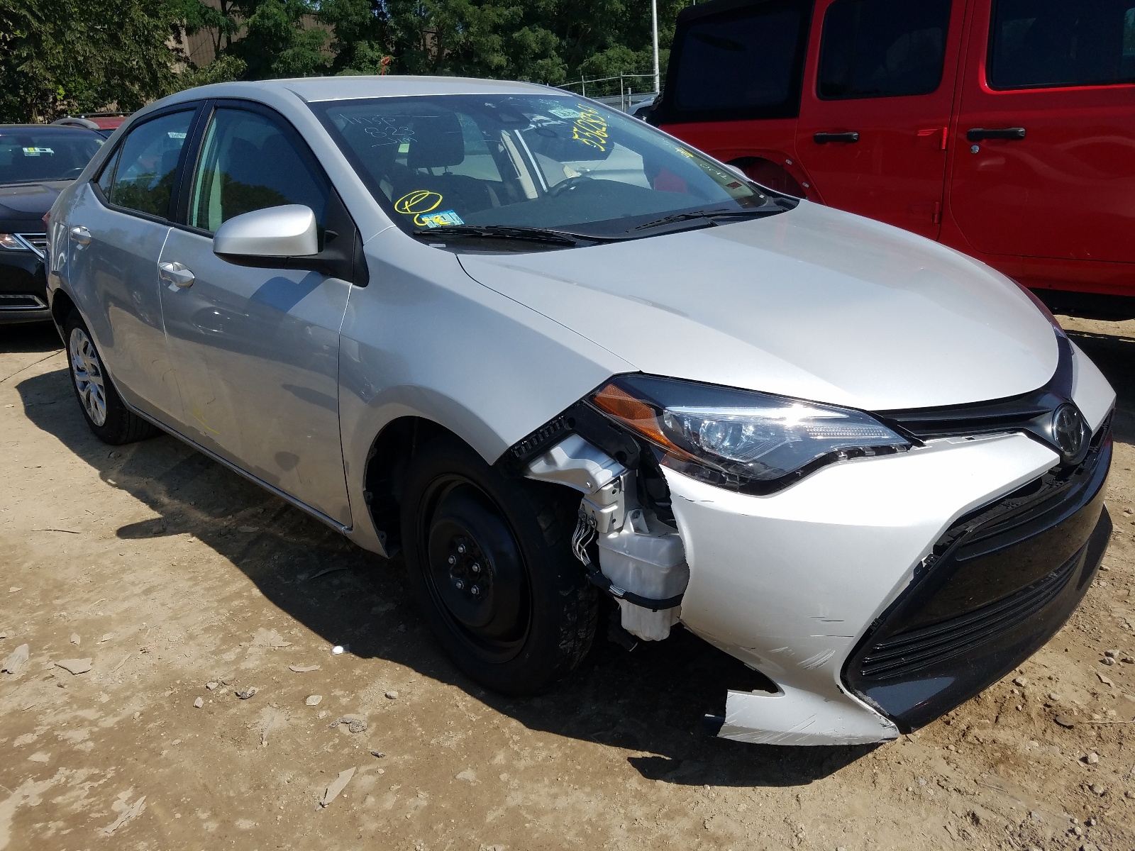 TOYOTA COROLLA L 2019 with VIN 5YFBURHE2KP940830 - Photo from auction