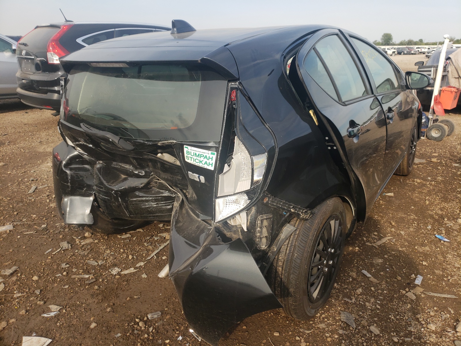 Photo 4 from auction – 2015 TOYOTA PRIUS C with VIN JTDKDTB34F1581317