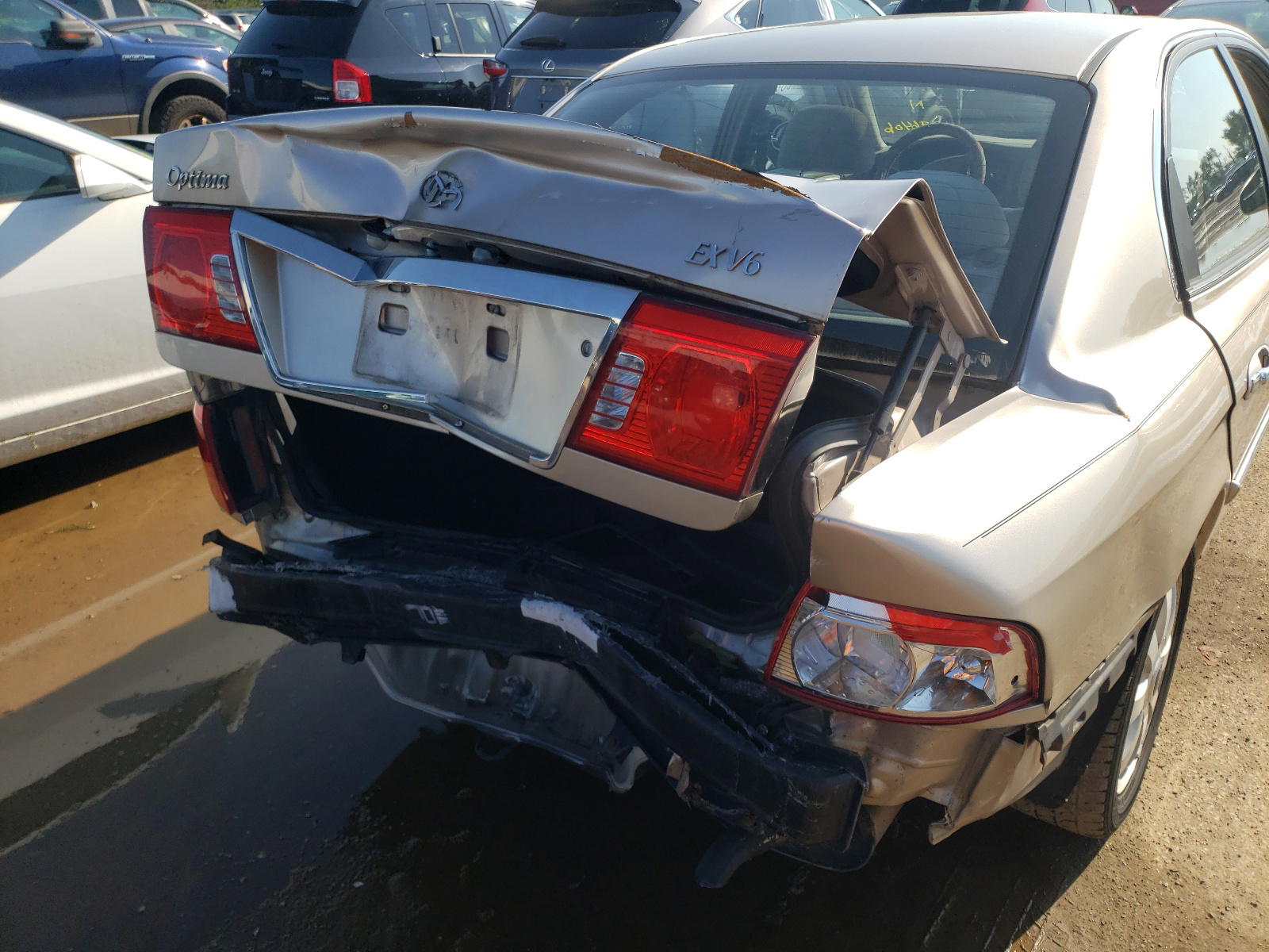 Photo 9 from auction – 2005 KIA OPTIMA LX with VIN KNAGD128655396406