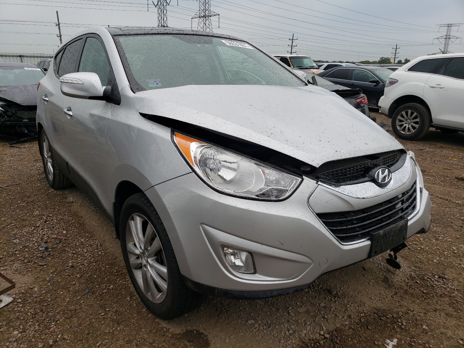 Photo 1 from auction – 2011 HYUNDAI TUCSON GLS with VIN KM8JUCAC2BU293054