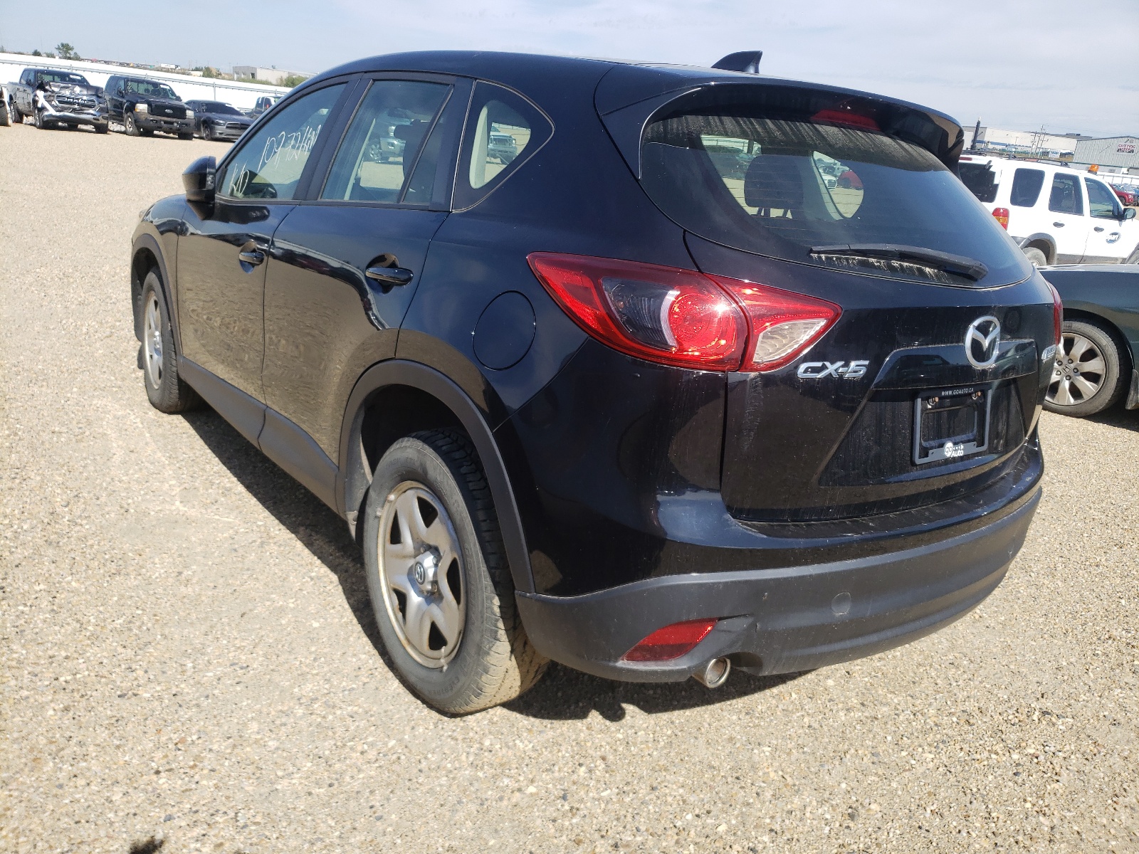 Photo 3 from auction – 2014 MAZDA CX-5 SPORT with VIN JM3KE2BE2E0390273