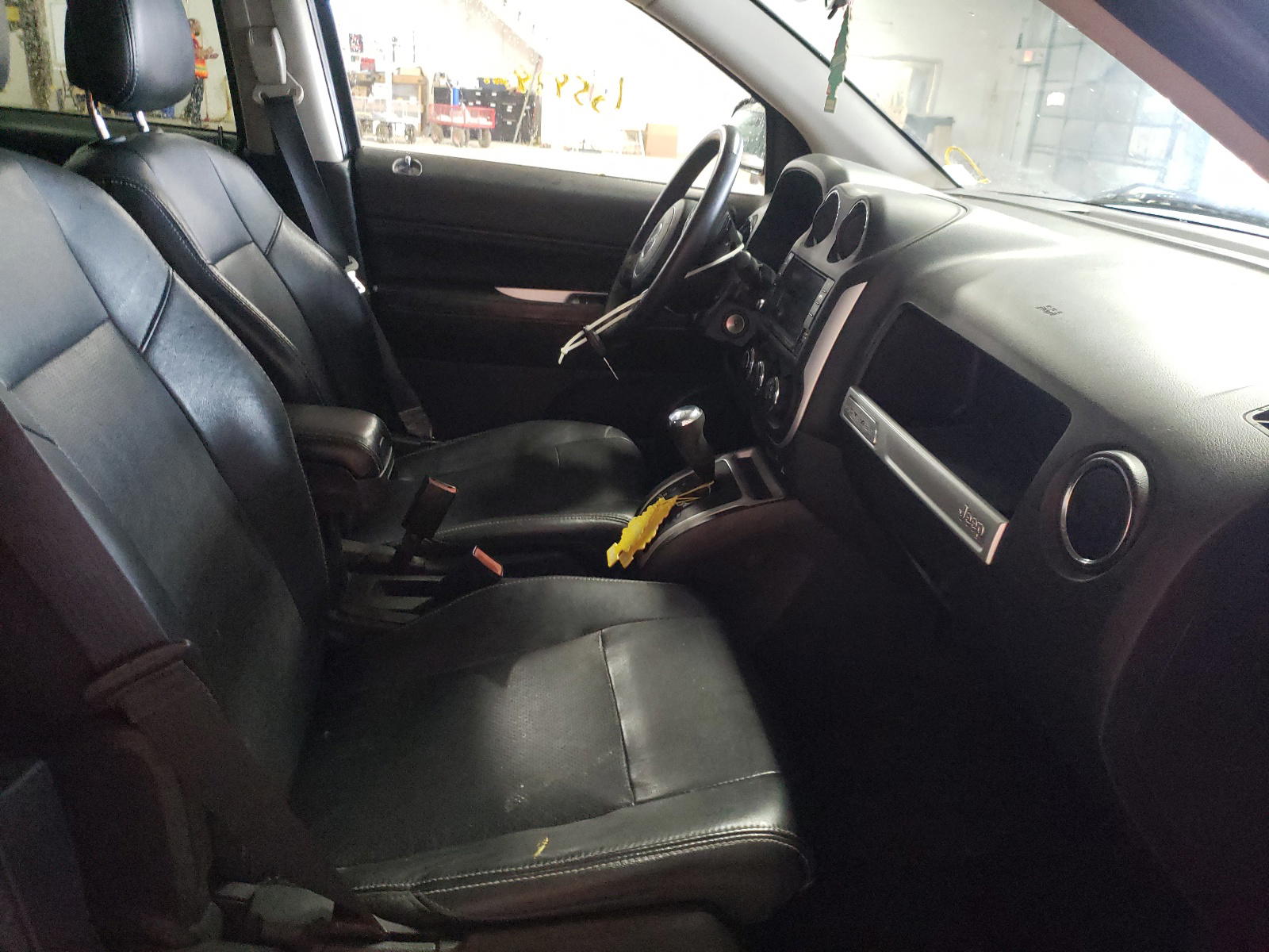 Photo 5 from auction – 2014 JEEP COMPASS LA with VIN 1C4NJCEA6ED758589