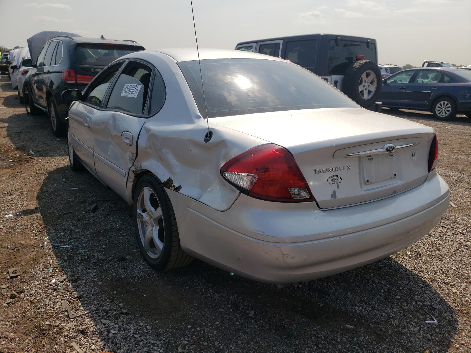 Photo 3 from auction – 2000 FORD TAURUS LX with VIN 1FAFP5223YG226401