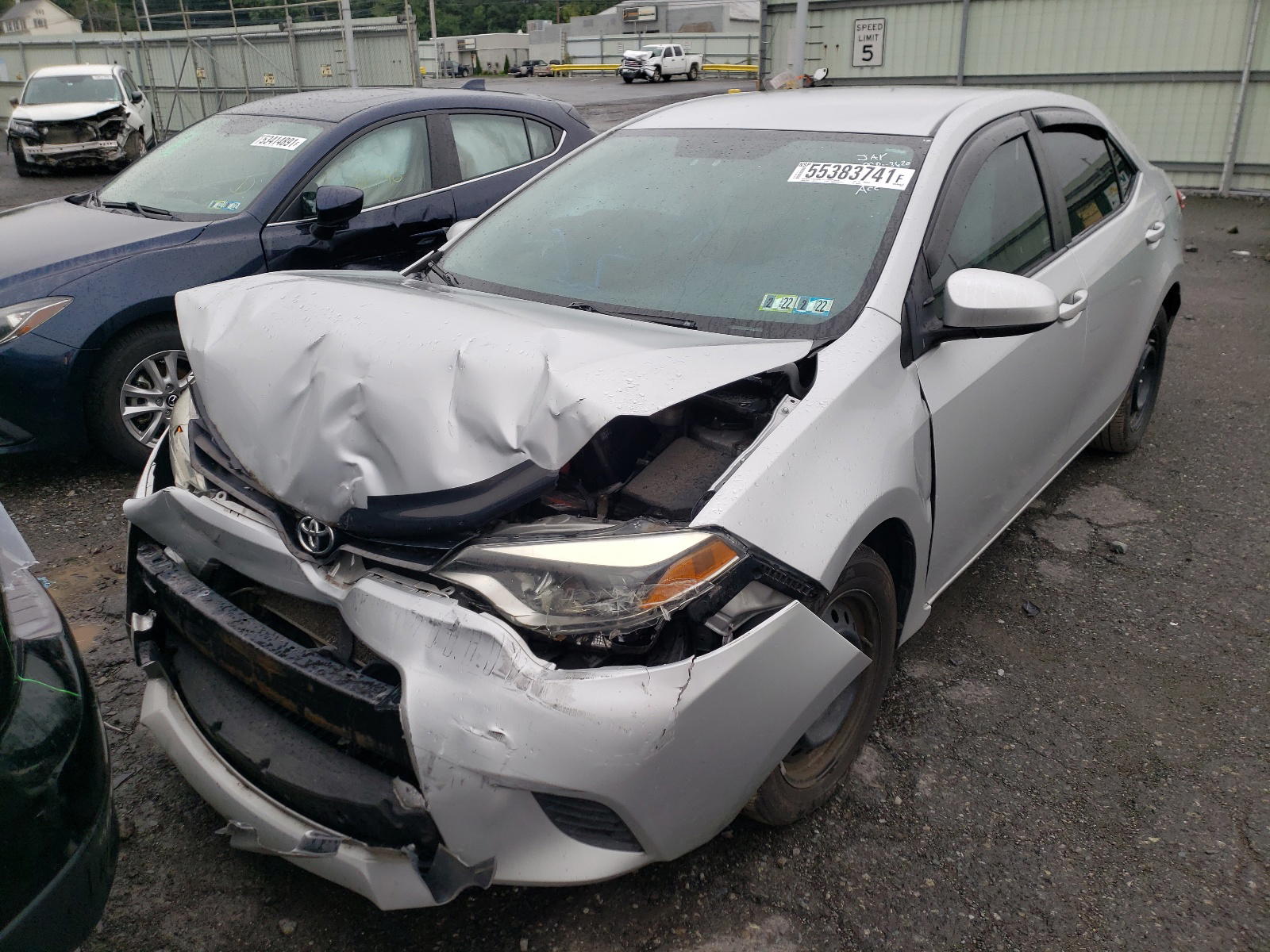Photo 2 from auction – 2014 TOYOTA COROLLA L with VIN 5YFBURHEXEP082687
