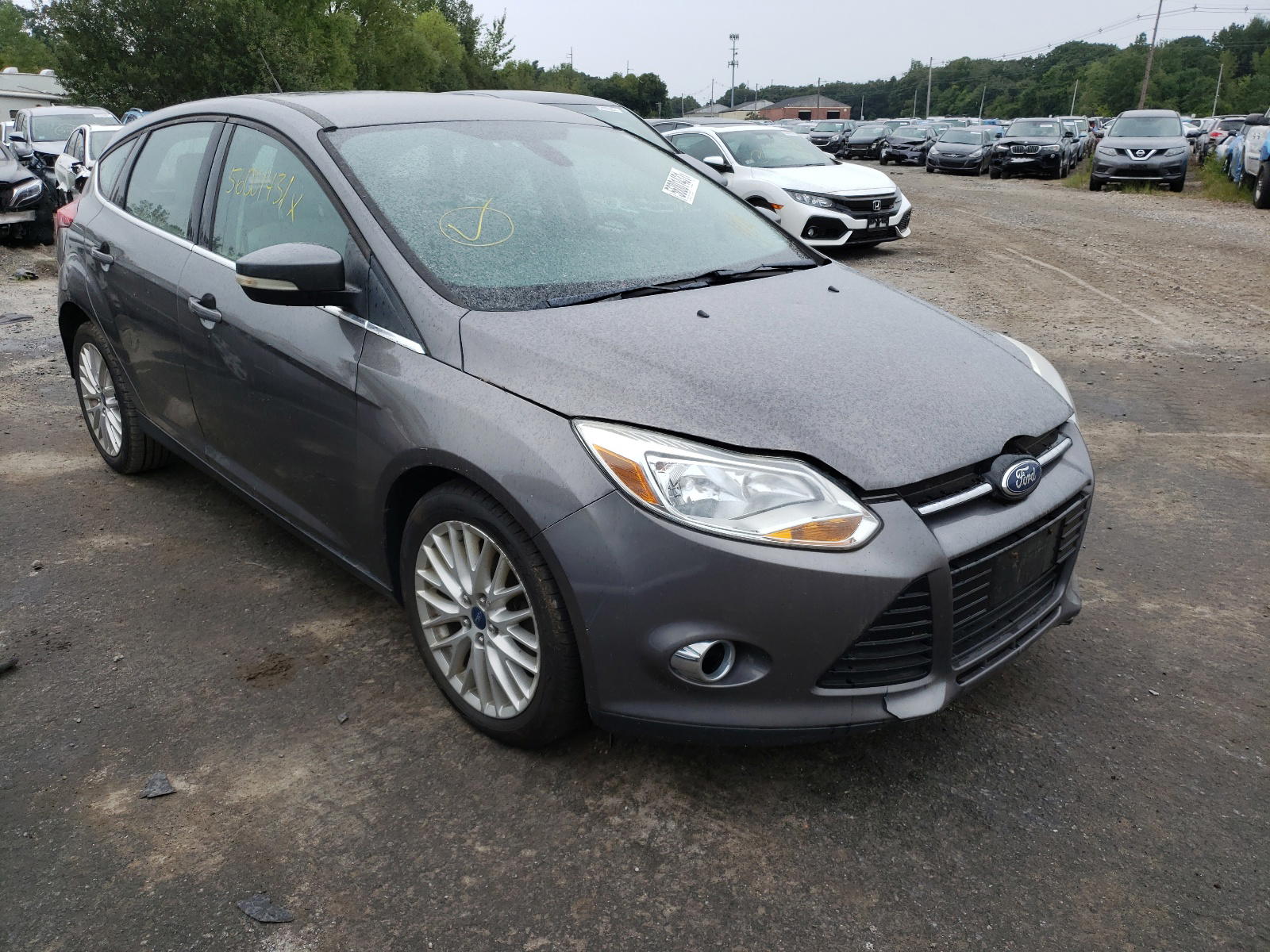 FORD FOCUS SEL 2012 with VIN 1FAHP3M24CL220195 - Photo from auction