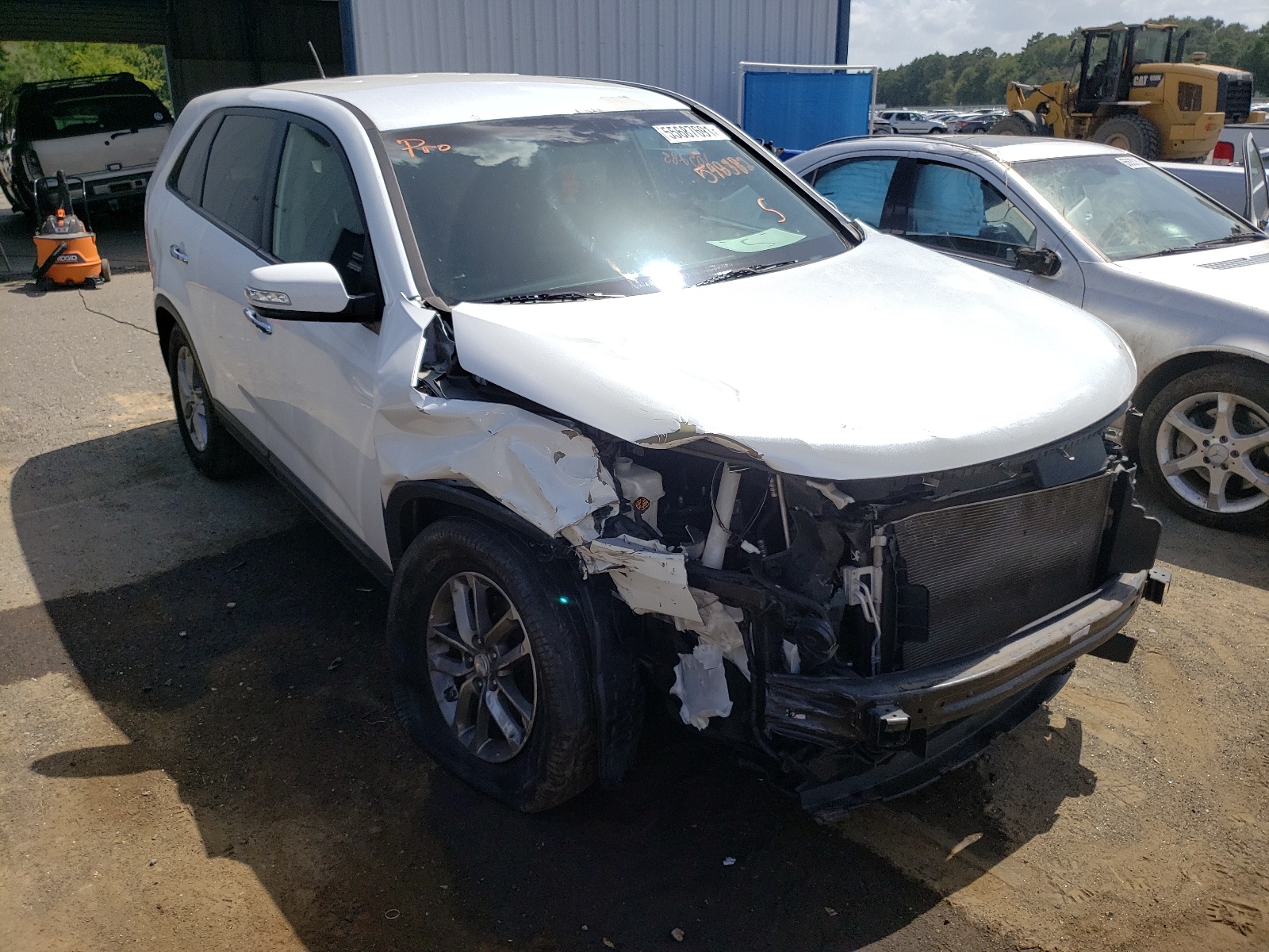 KIA SORENTO LX 2015 with VIN 5XYKT3A63FG598382 - Photo from auction