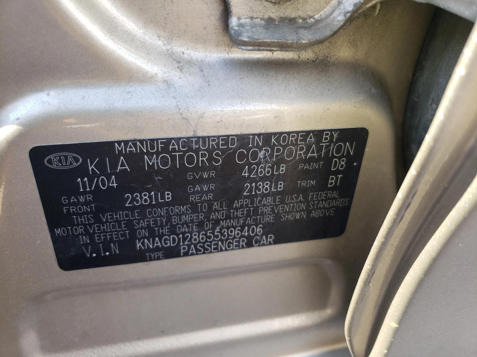Photo 10 from auction – 2005 KIA OPTIMA LX with VIN KNAGD128655396406