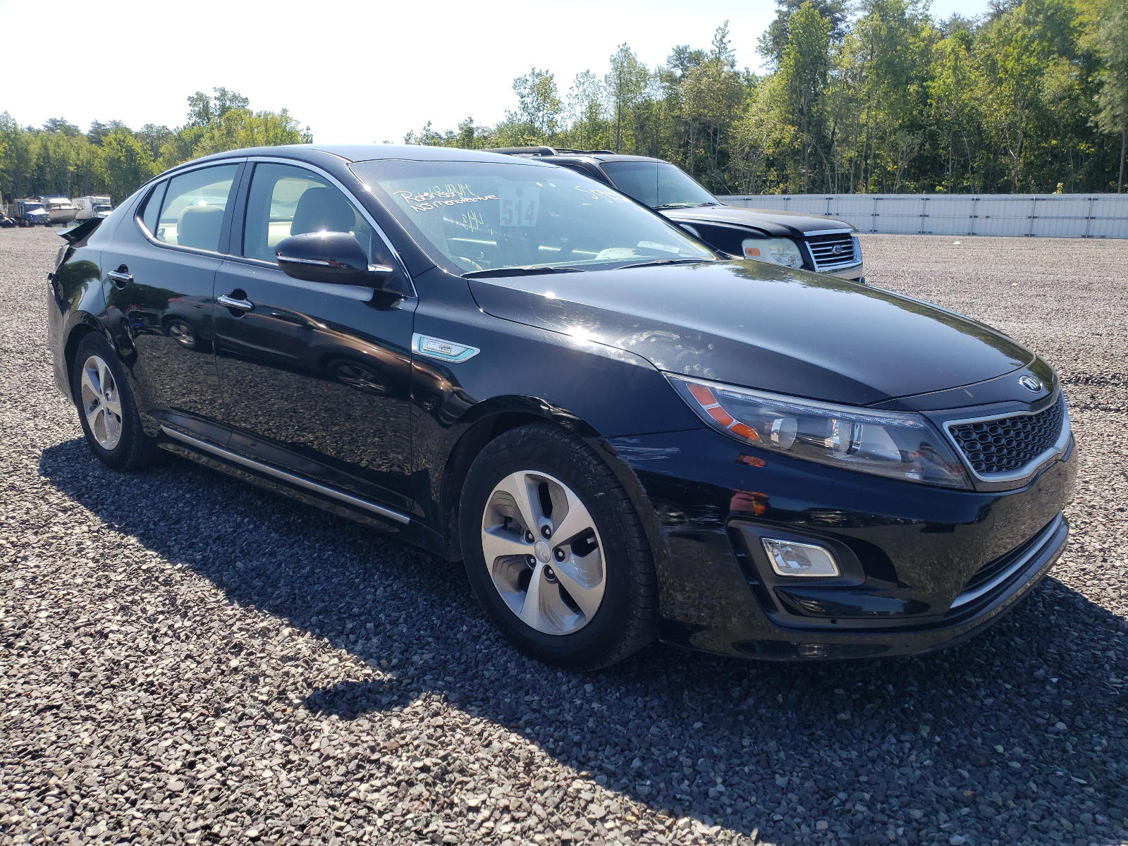 KIA OPTIMA HYB 2016 with VIN KNAGM4AD7G5092990 - Photo from auction