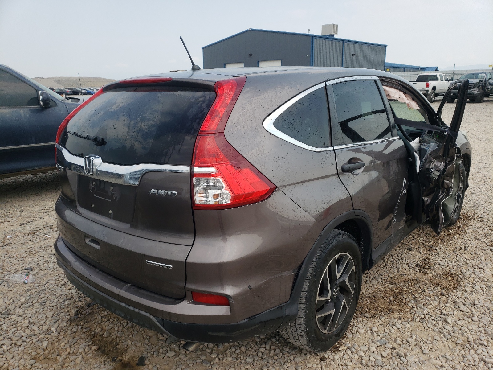 Photo 4 from auction – 2016 HONDA CR-V SE with VIN 2HKRM4H40GH651698