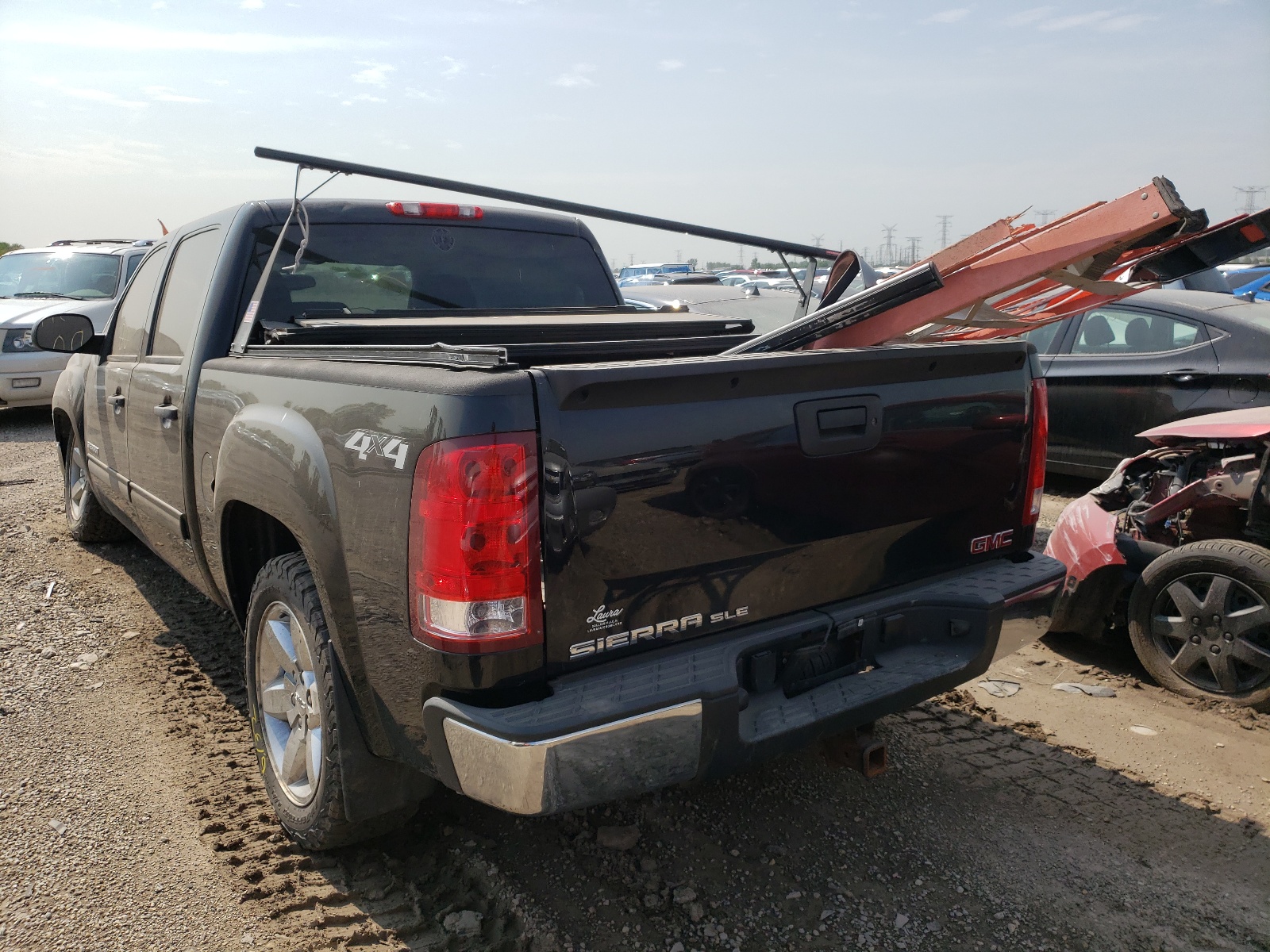 Photo 3 from auction – 2013 GMC SIERRA K15 with VIN 3GTP2VE76DG377879