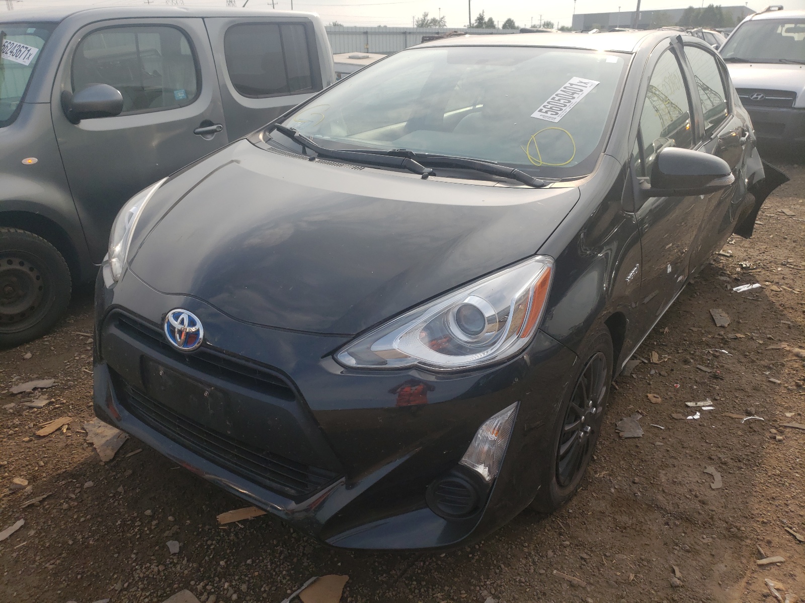 Photo 2 from auction – 2015 TOYOTA PRIUS C with VIN JTDKDTB34F1581317