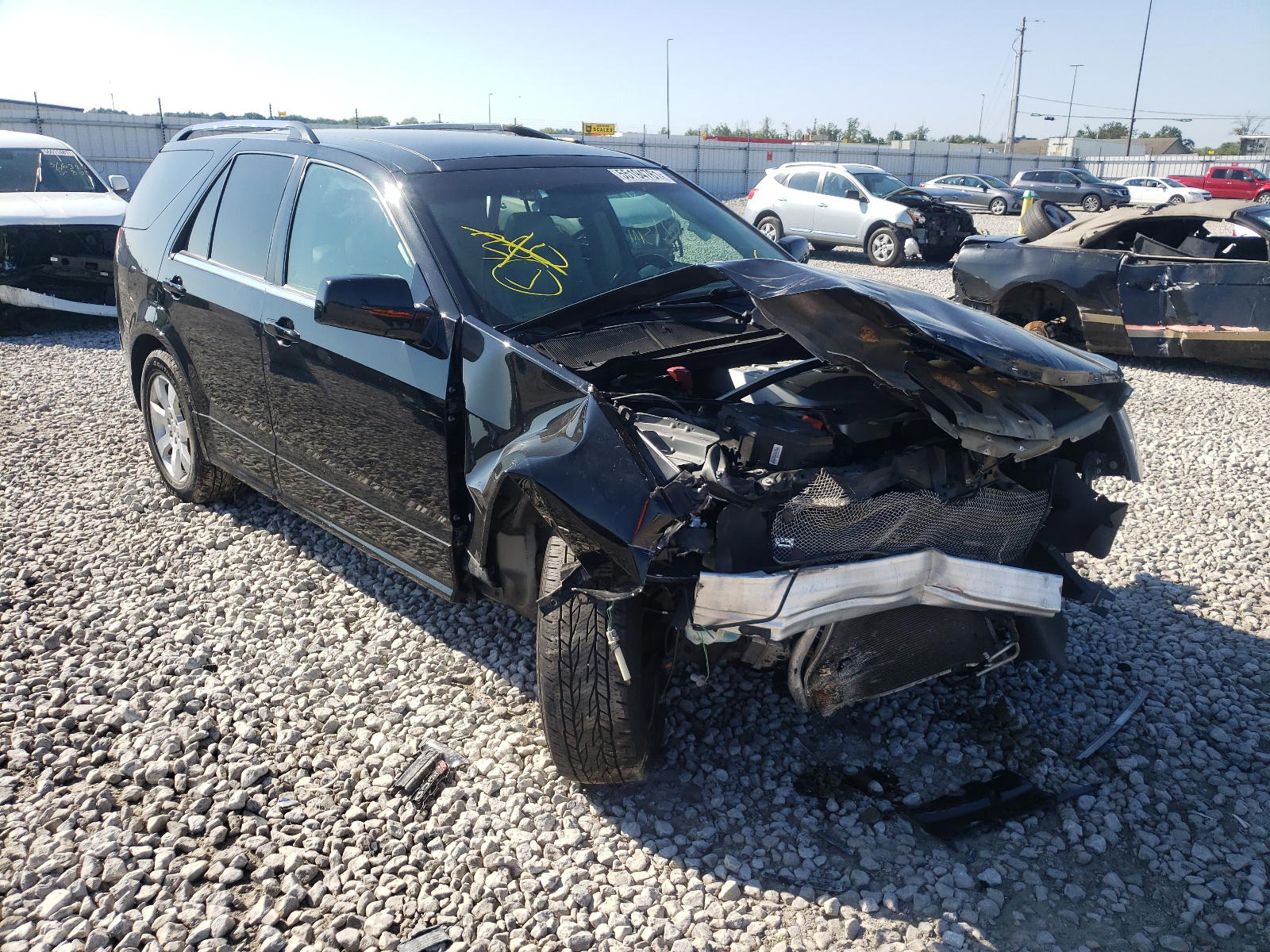 CADILLAC SRX 2009 with VIN 1GYEE437390106828 - Photo from auction