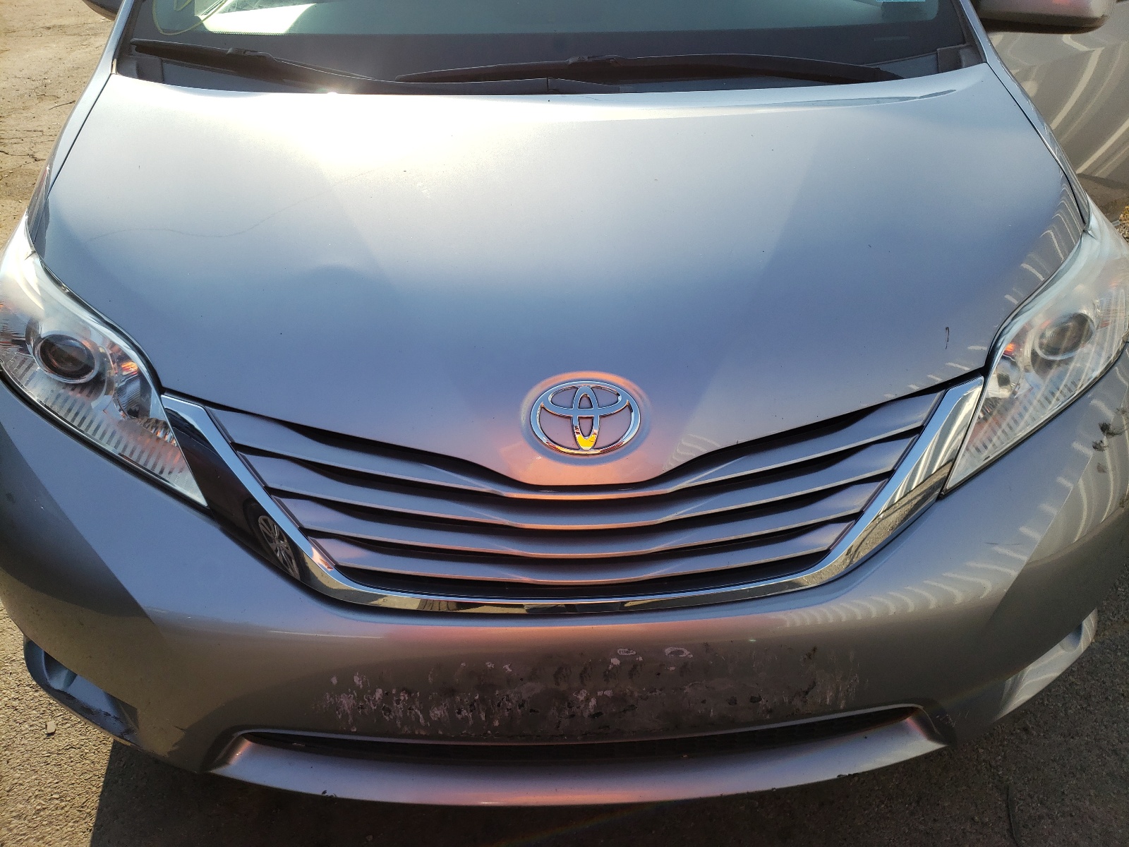 Photo 7 from auction – 2015 TOYOTA SIENNA LE with VIN 5TDJK3DC8FS094932