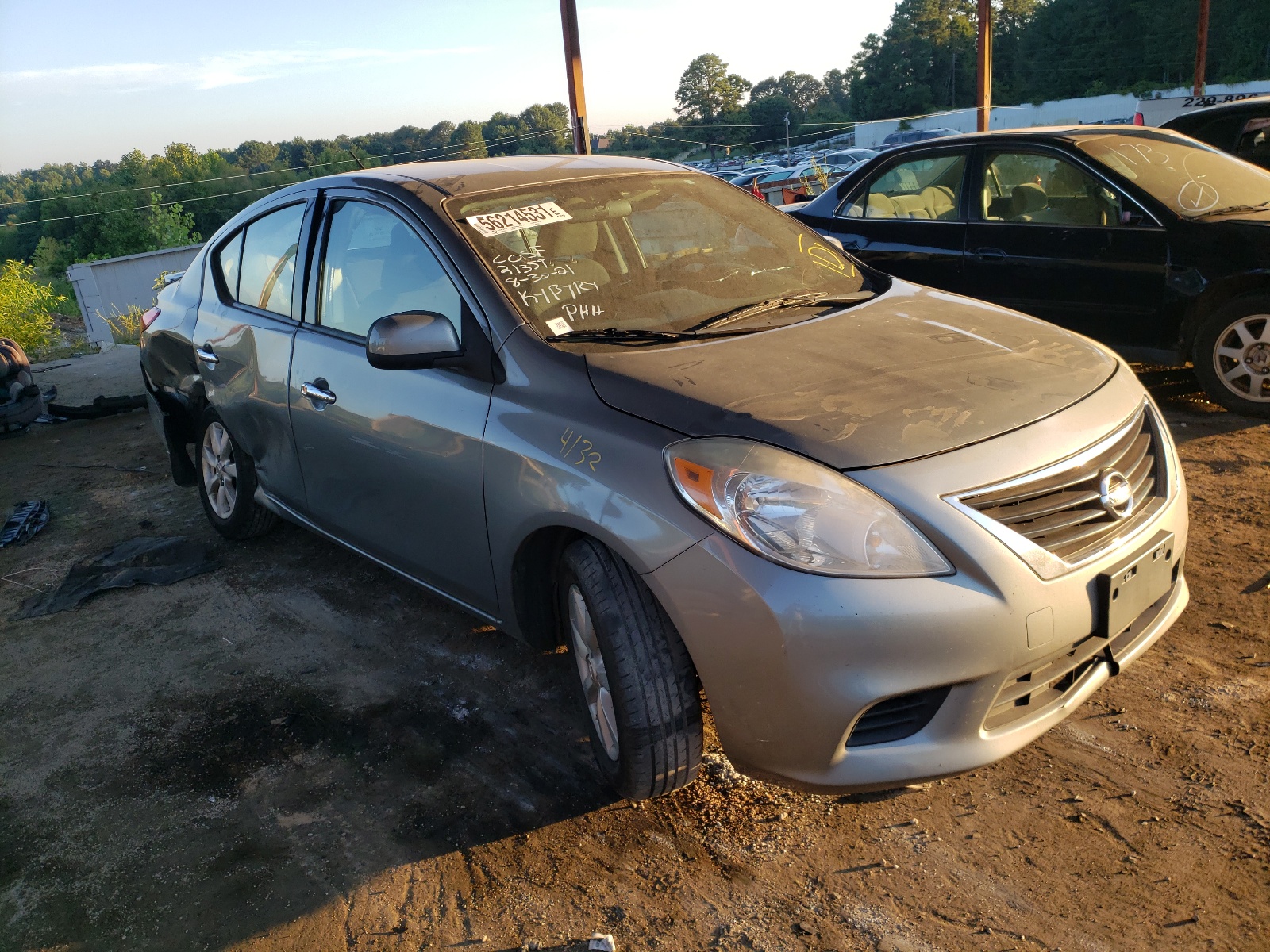 NISSAN VERSA S 2014 with VIN 3N1CN7AP5EL806593 - Photo from auction