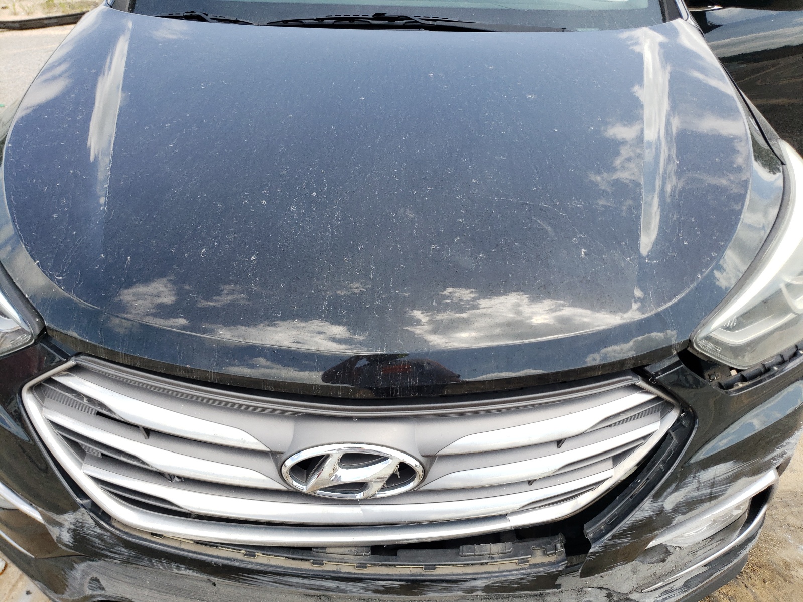 Photo 7 from auction – 2017 HYUNDAI SANTA FE S with VIN 5NMZU3LBXHH031956