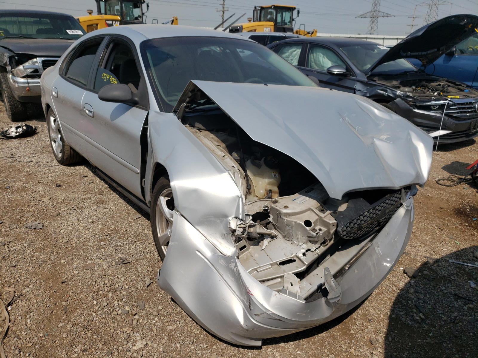 FORD TAURUS LX 2000 with VIN 1FAFP5223YG226401 - Photo from auction