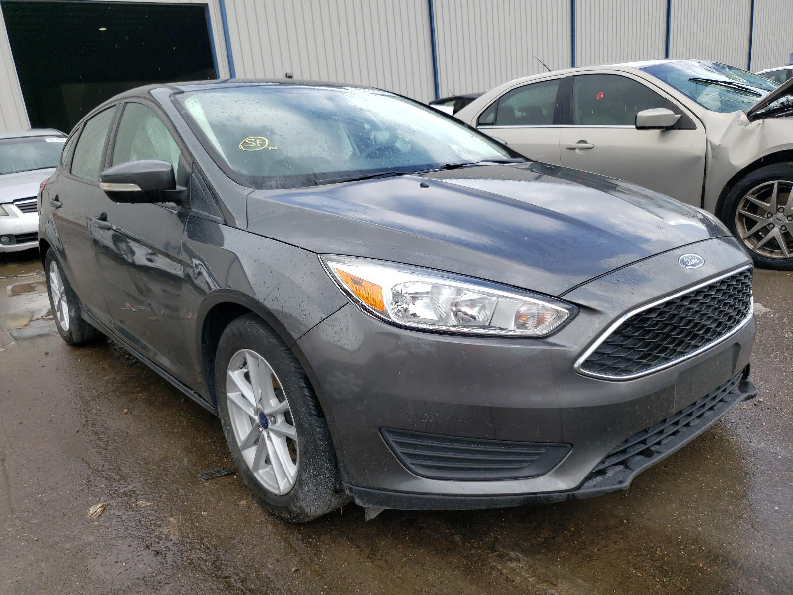 FORD FOCUS SE 2017 with VIN 1FADP3K26HL317441 - Photo from auction