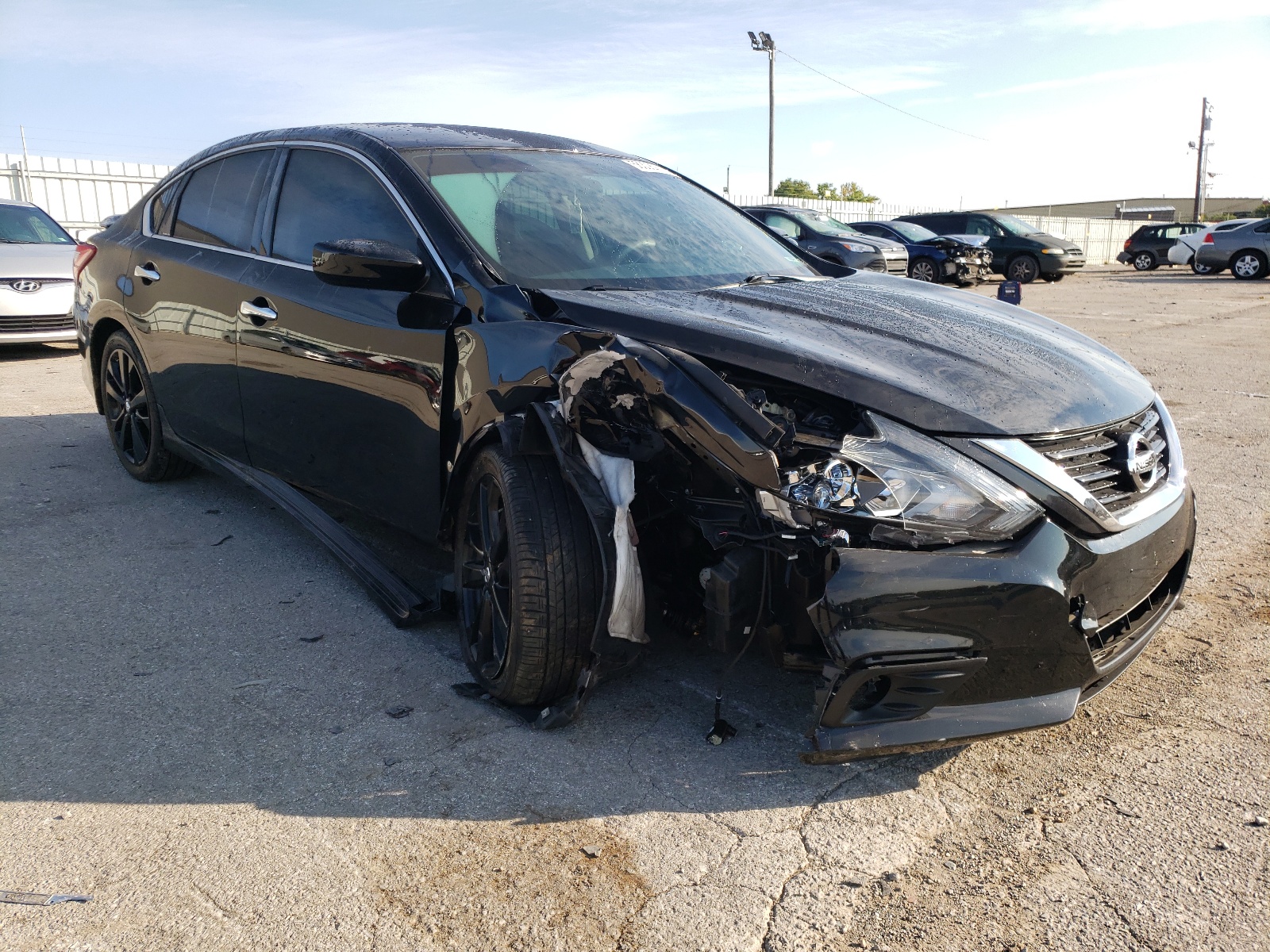 NISSAN ALTIMA 2.5 2017 with VIN 1N4AL3AP2HC266628 - Photo from auction