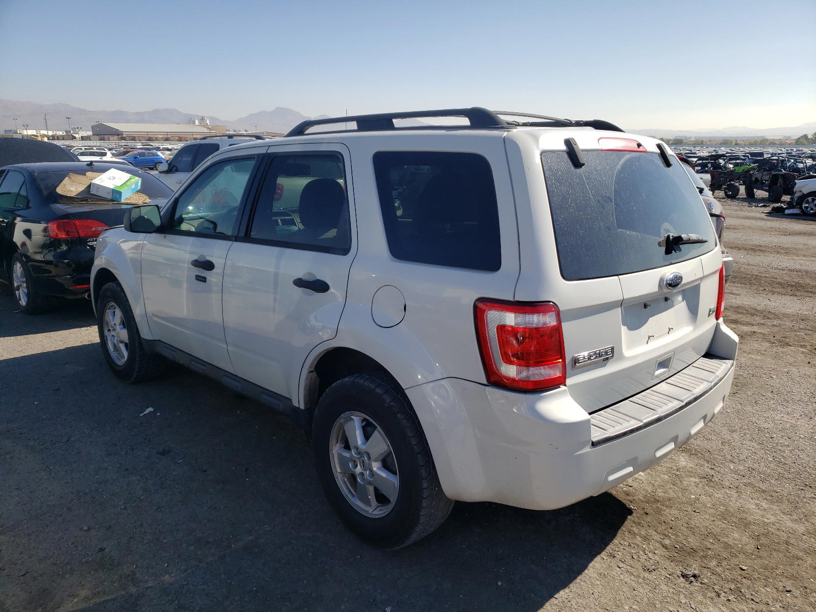 Photo 3 from auction – 2011 FORD ESCAPE XLT with VIN 1FMCU9DG1BKA51099