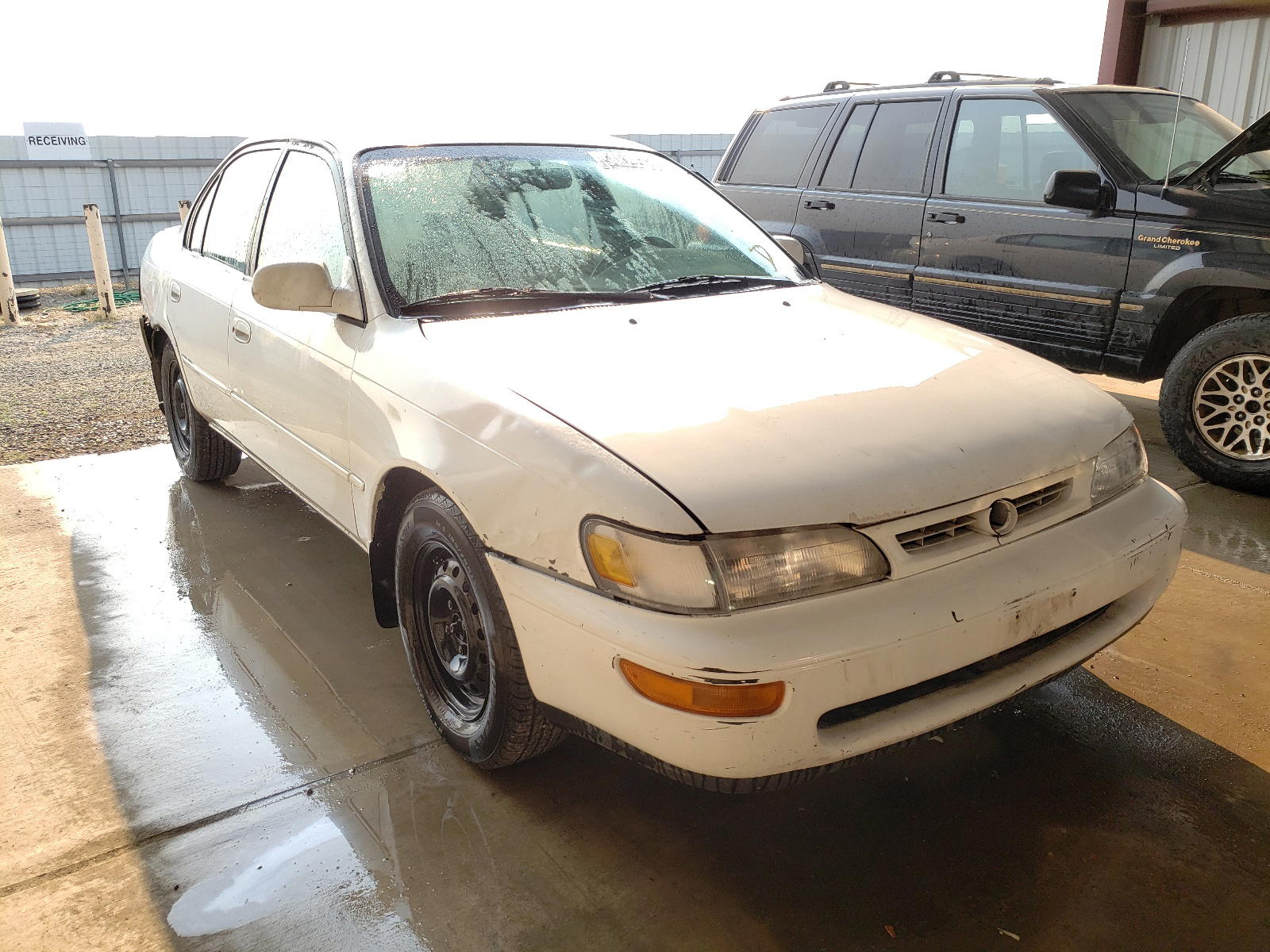 TOYOTA COROLLA DX 1997 with VIN 1NXBB02E2VZ548637 - Photo from auction
