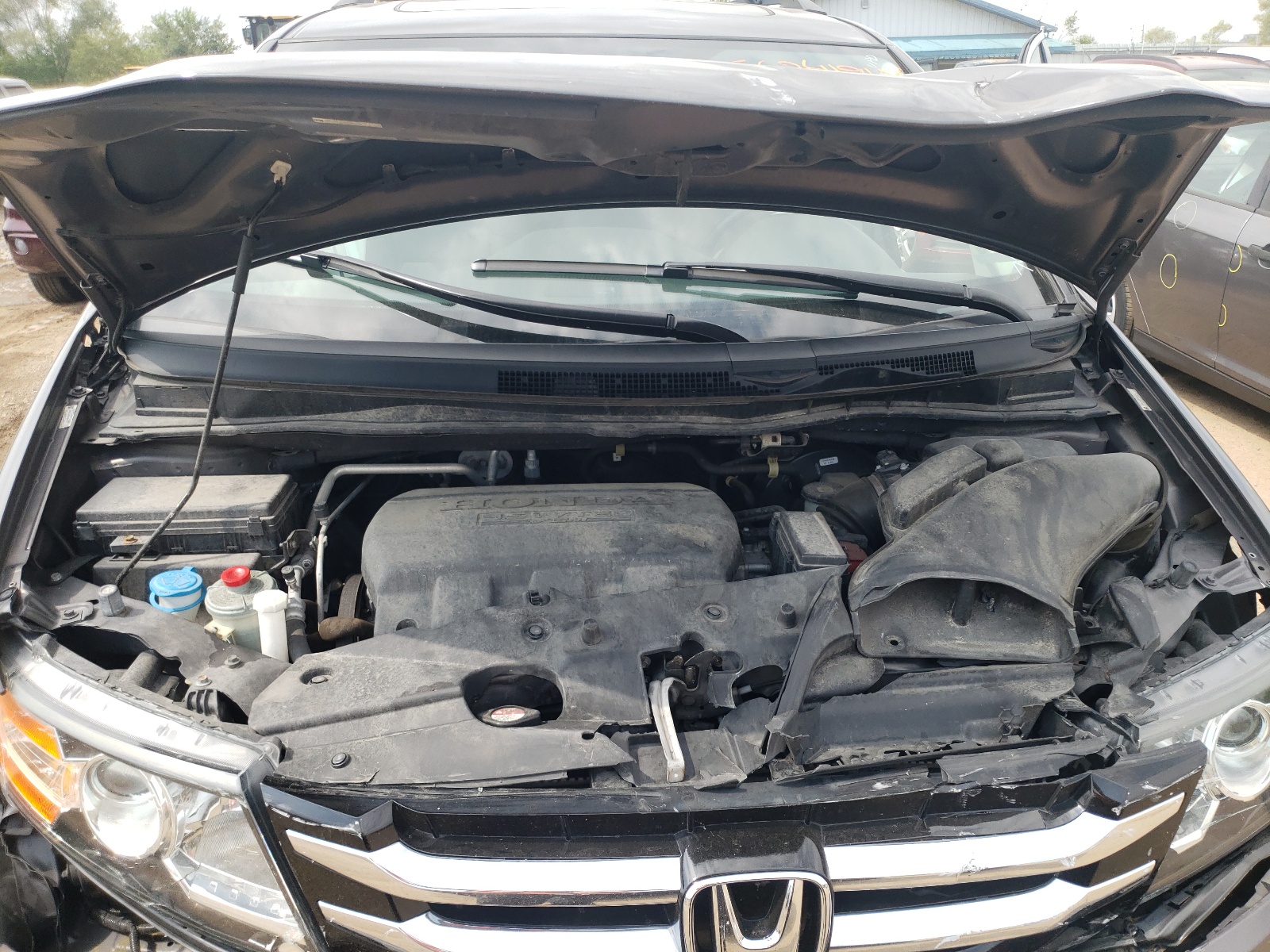 Photo 7 from auction – 2015 HONDA ODYSSEY TO with VIN 5FNRL5H90FB097015