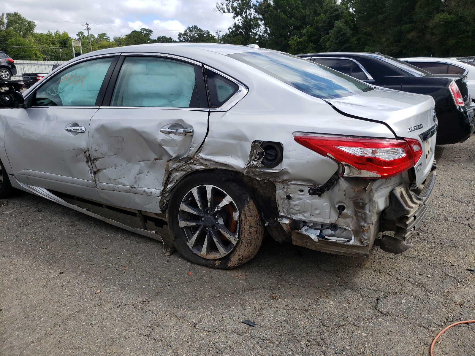 Photo 9 from auction – 2016 NISSAN ALTIMA 2.5 with VIN 1N4AL3AP0GC141691