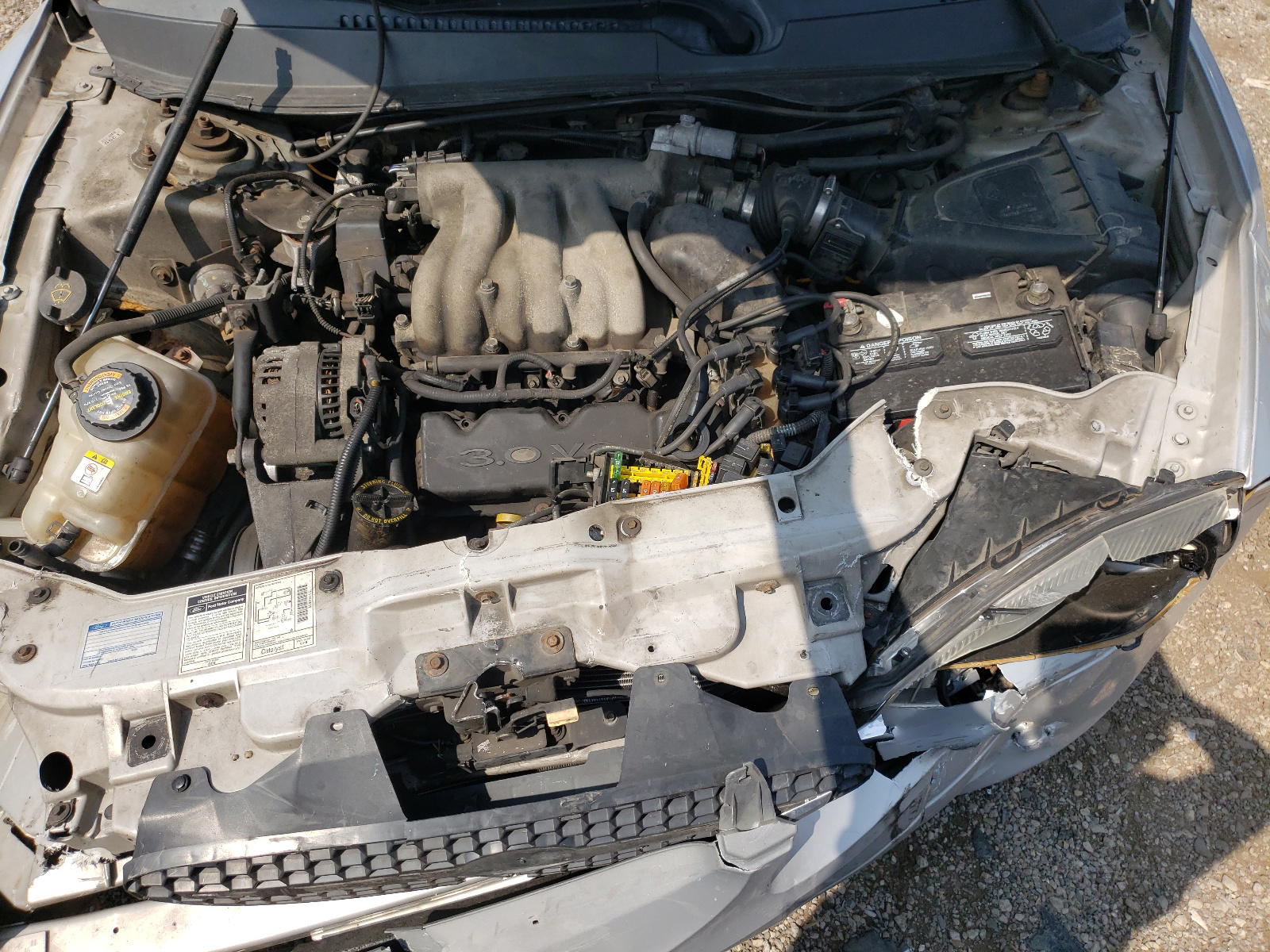 Photo 7 from auction – 2000 FORD TAURUS LX with VIN 1FAFP5223YG226401